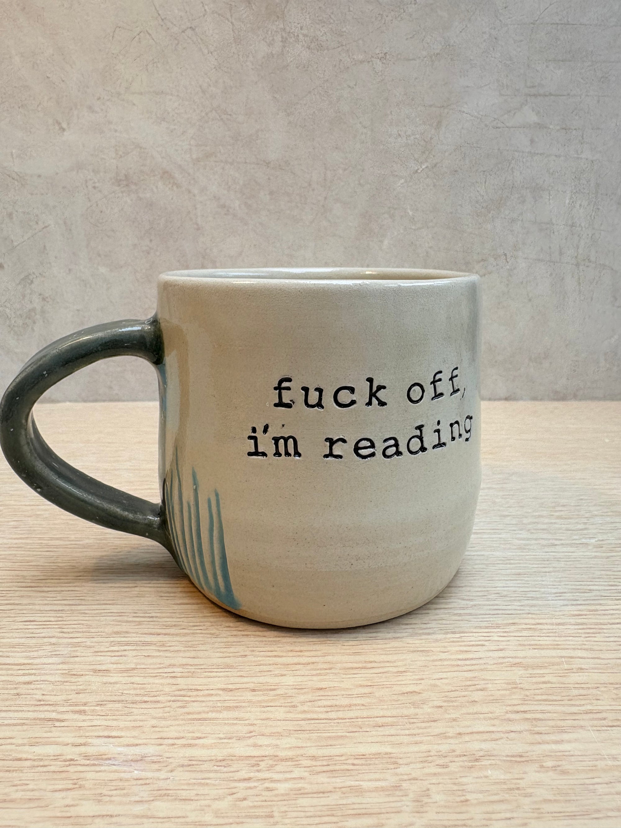 “Fuck off i'm reading" mug (Turquoise Grooves)