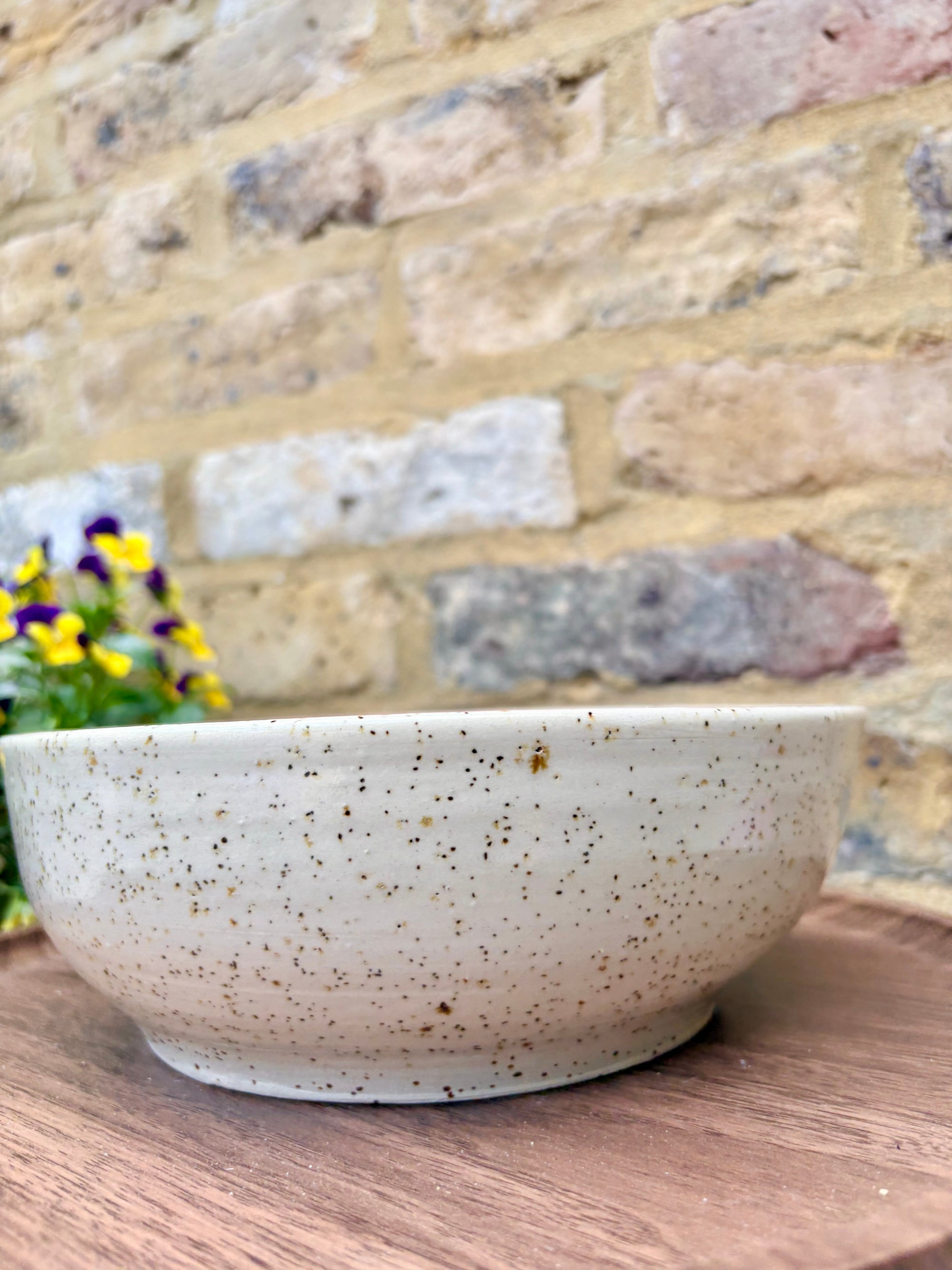 “eat, drink and fuck off by 9pm"  deep round salad/pasta bowl (pink, flecked clay)