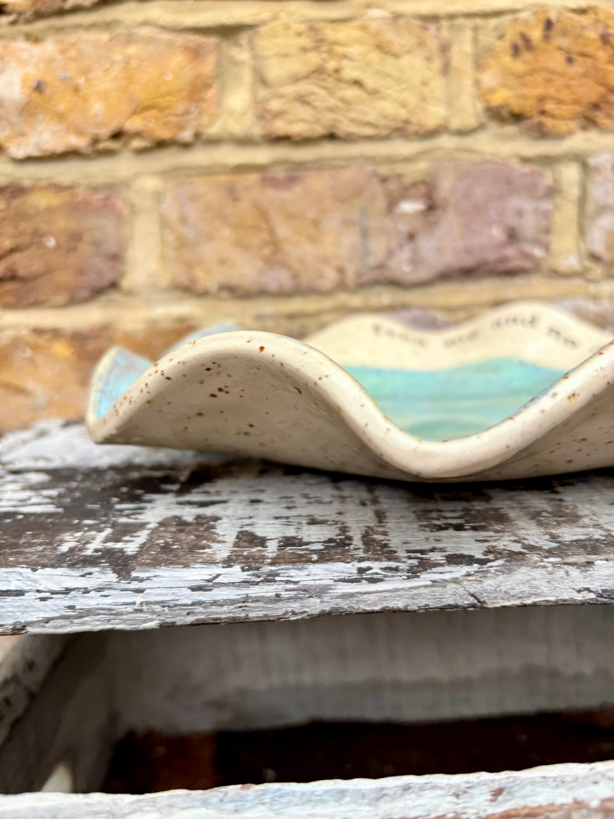 "feed me and no one gets hurt"  serving dish