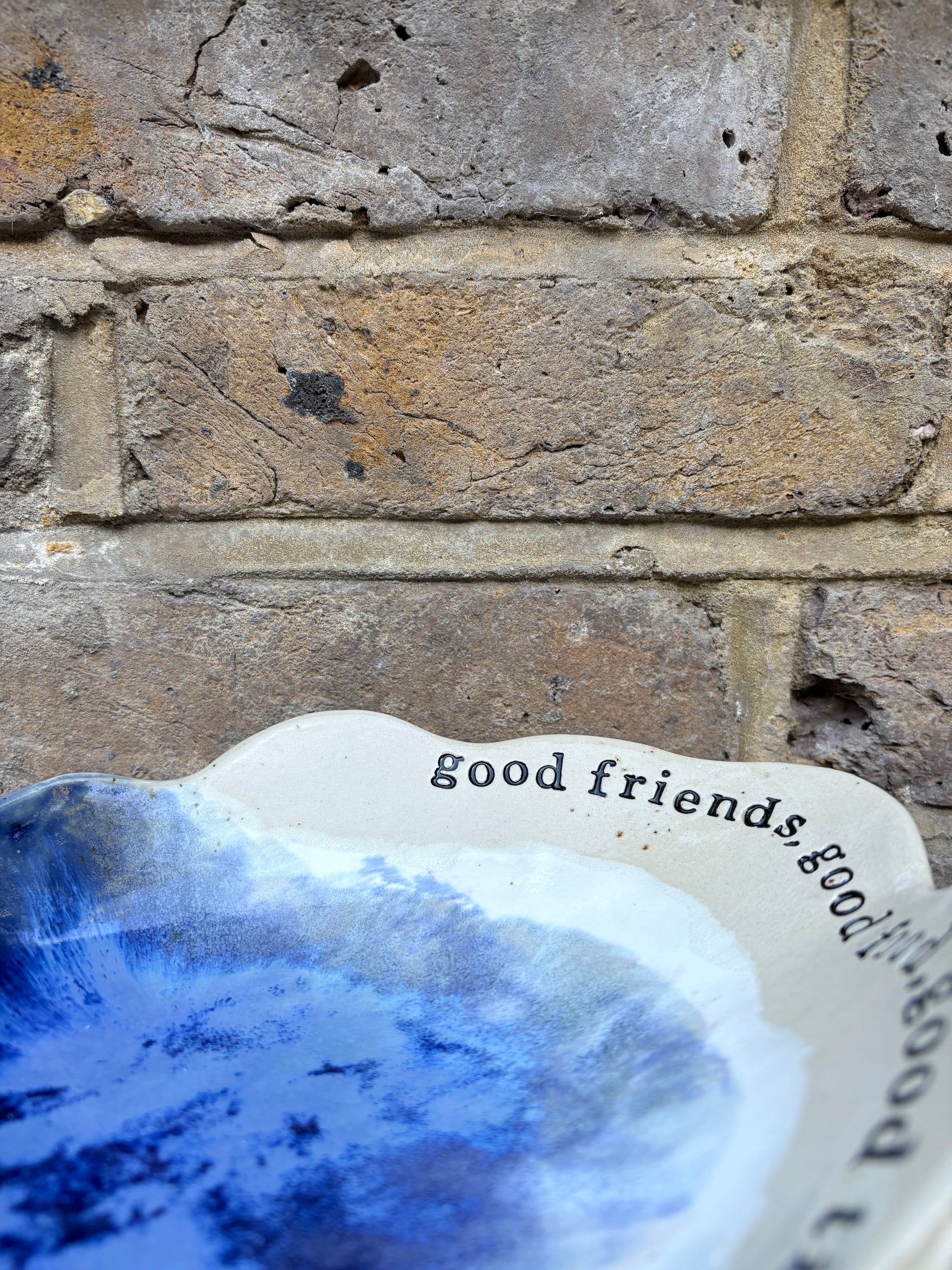"good food, good wine, good times..." long salad dish