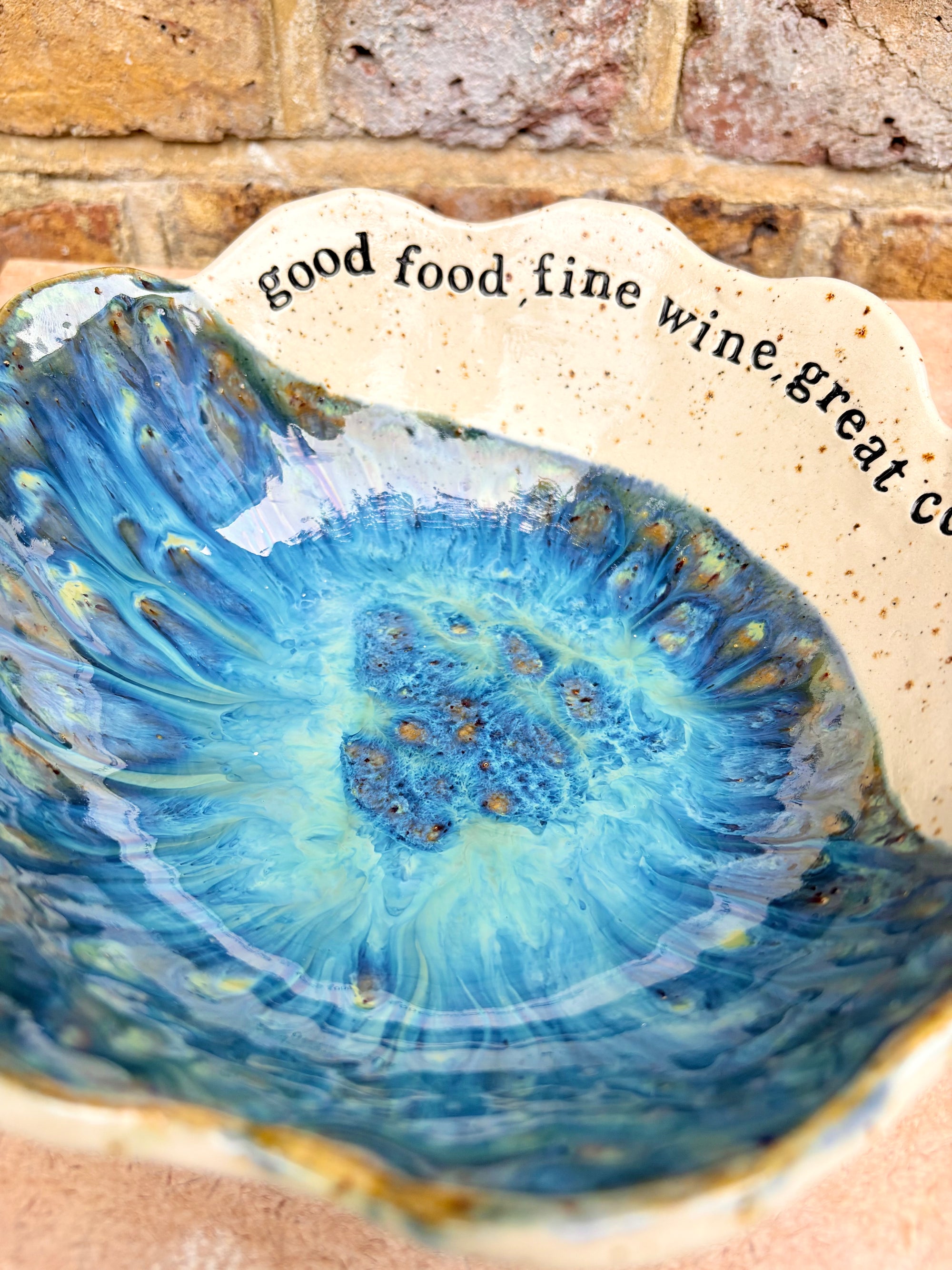 "good food, fine wine, great company..." deep salad/serving dish