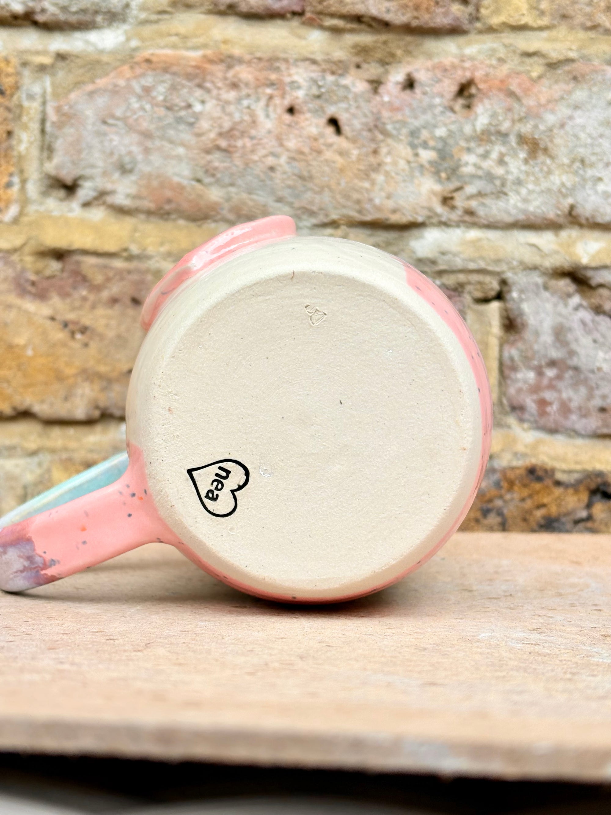 “love is love” mug (pink heart)