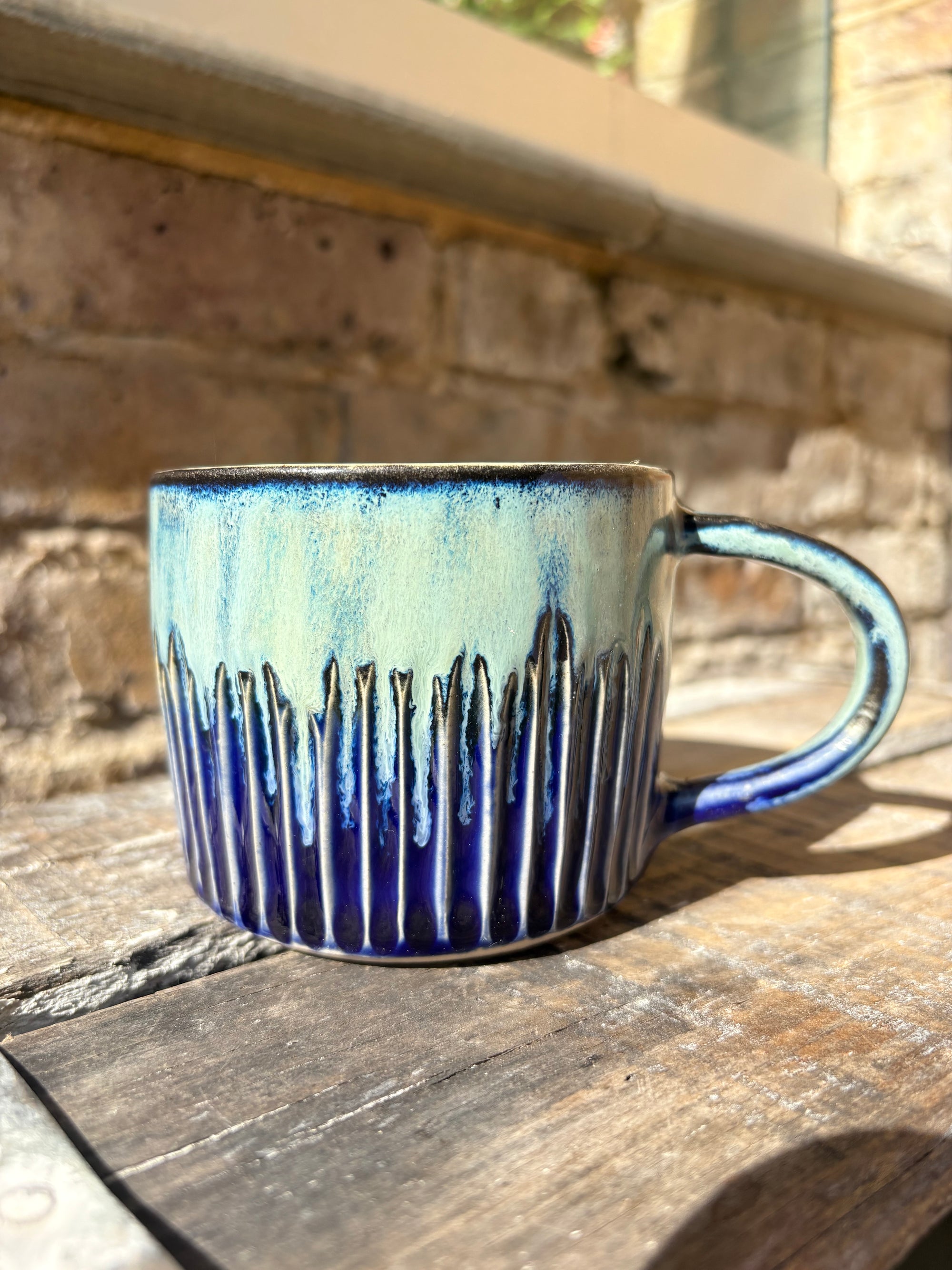 "really happy to be here” "what a bunch of cunts" mug (medium, blue shore)