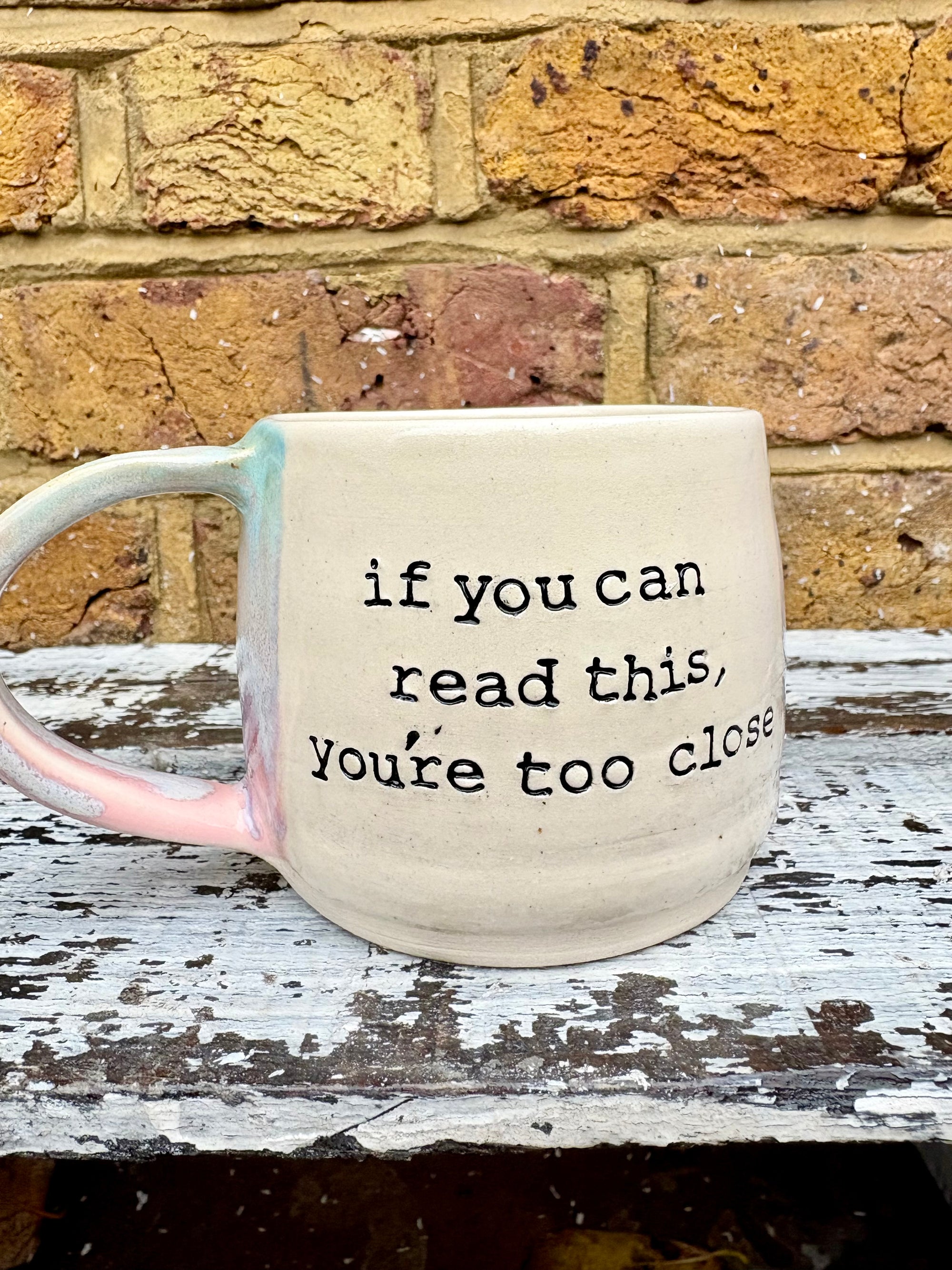 "if you can read this, you're too close" mug (Pink Skies)
