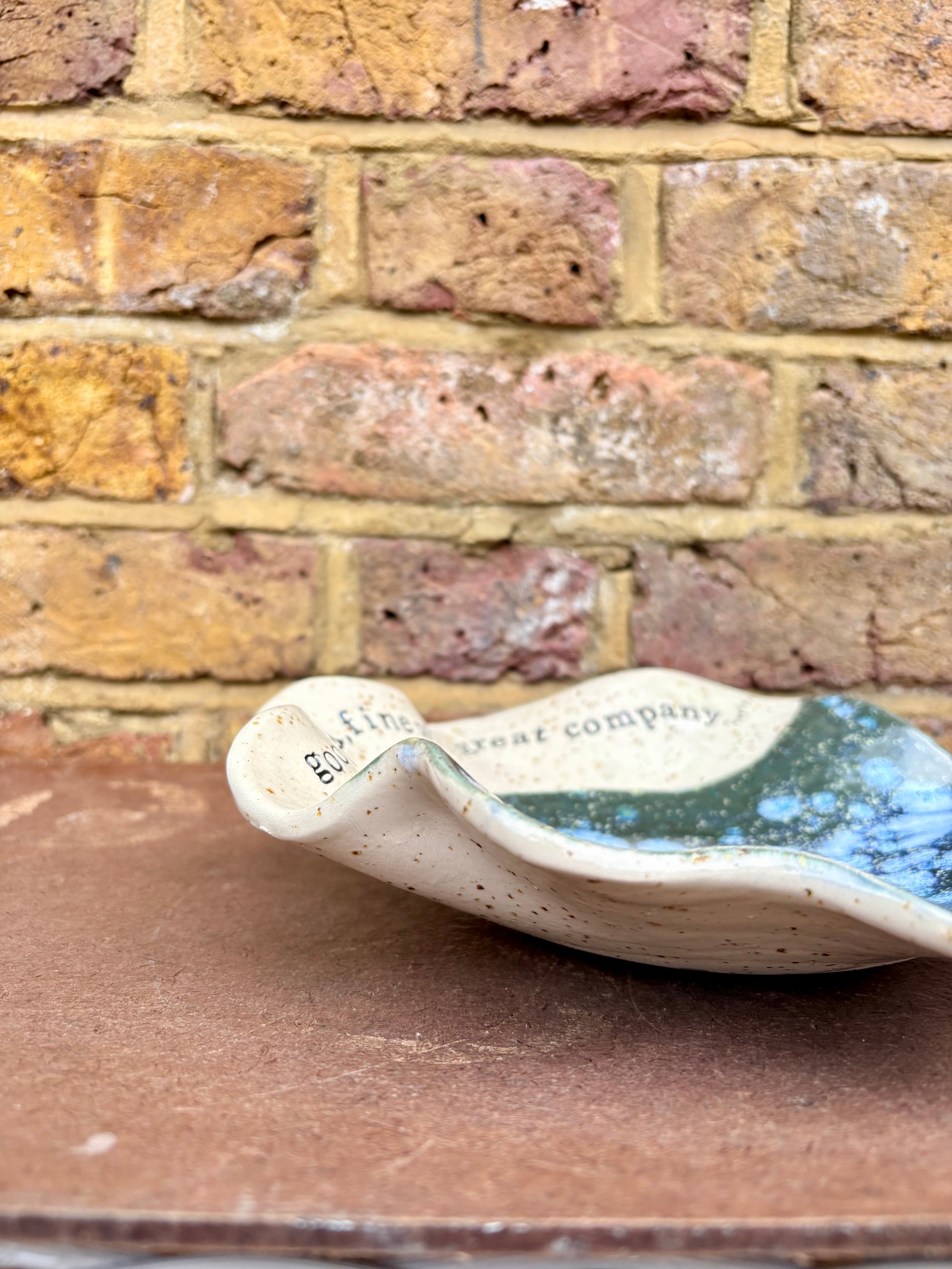 "good food, fine wine, great company..." salad/serving dish (teal green diffusion)