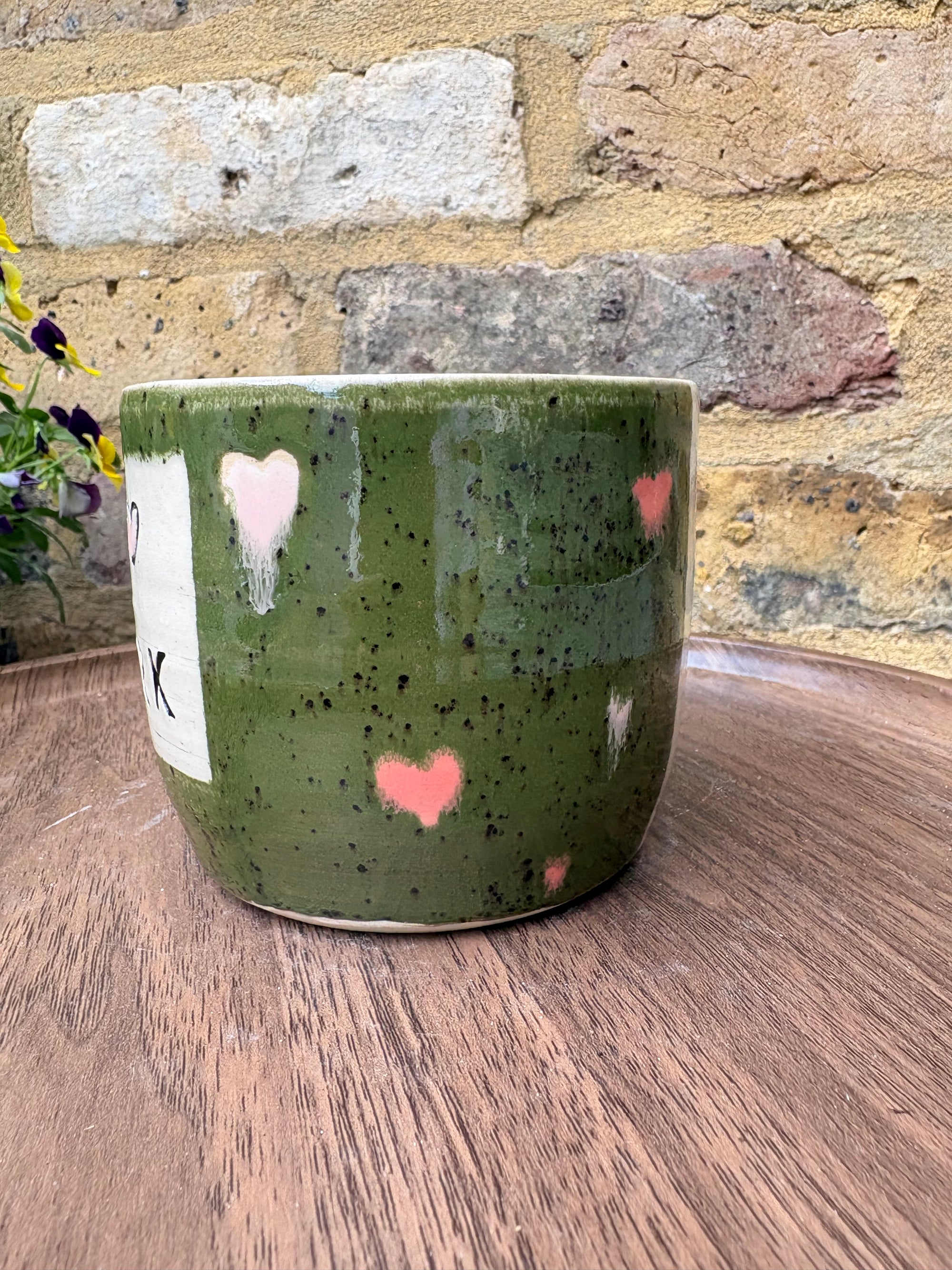 "I 🩷 WORK” "everyone in this place is a cunt" mug (green, right hander, pink hearts)