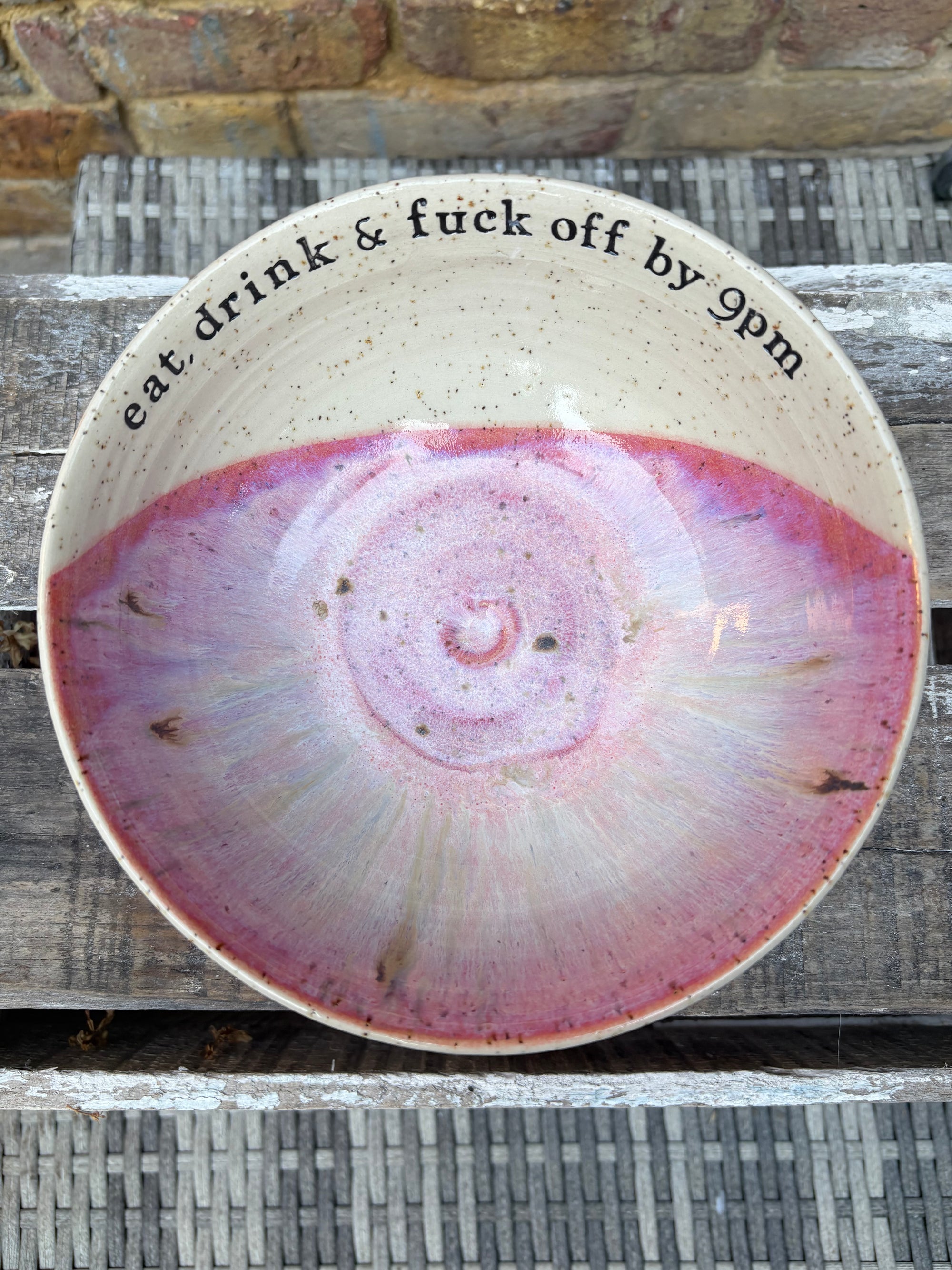 “eat, drink and fuck off by 9pm"  deep round salad/pasta bowl (pink, flecked clay)