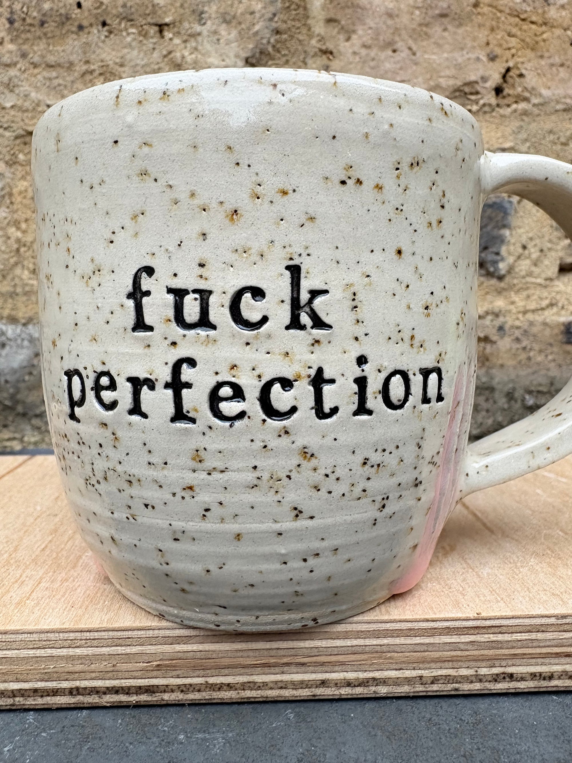 “fuck perfection" mug (pale pink grooves)