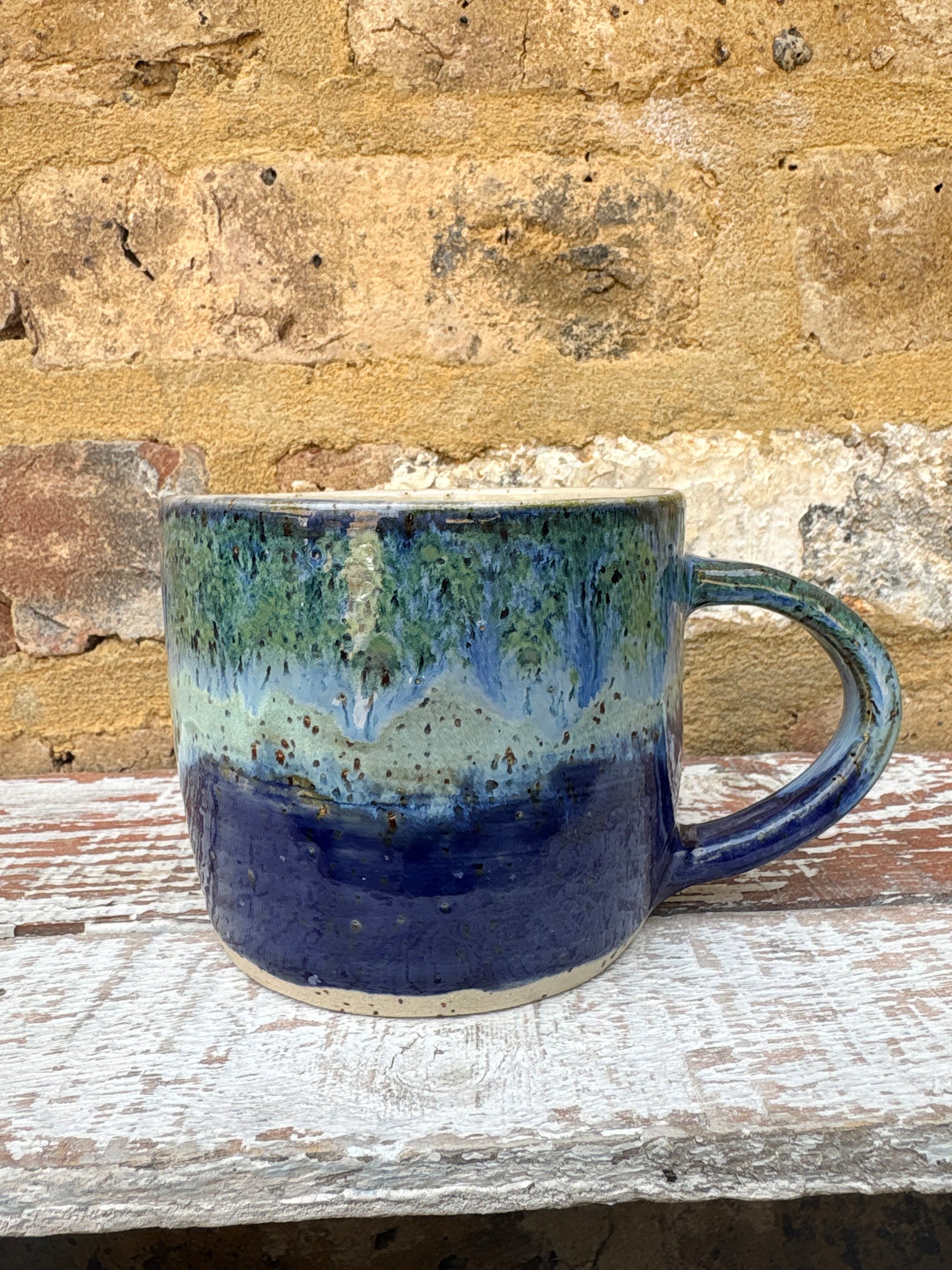 "really happy to be here” "what a bunch of cunts" mug (blue/green)