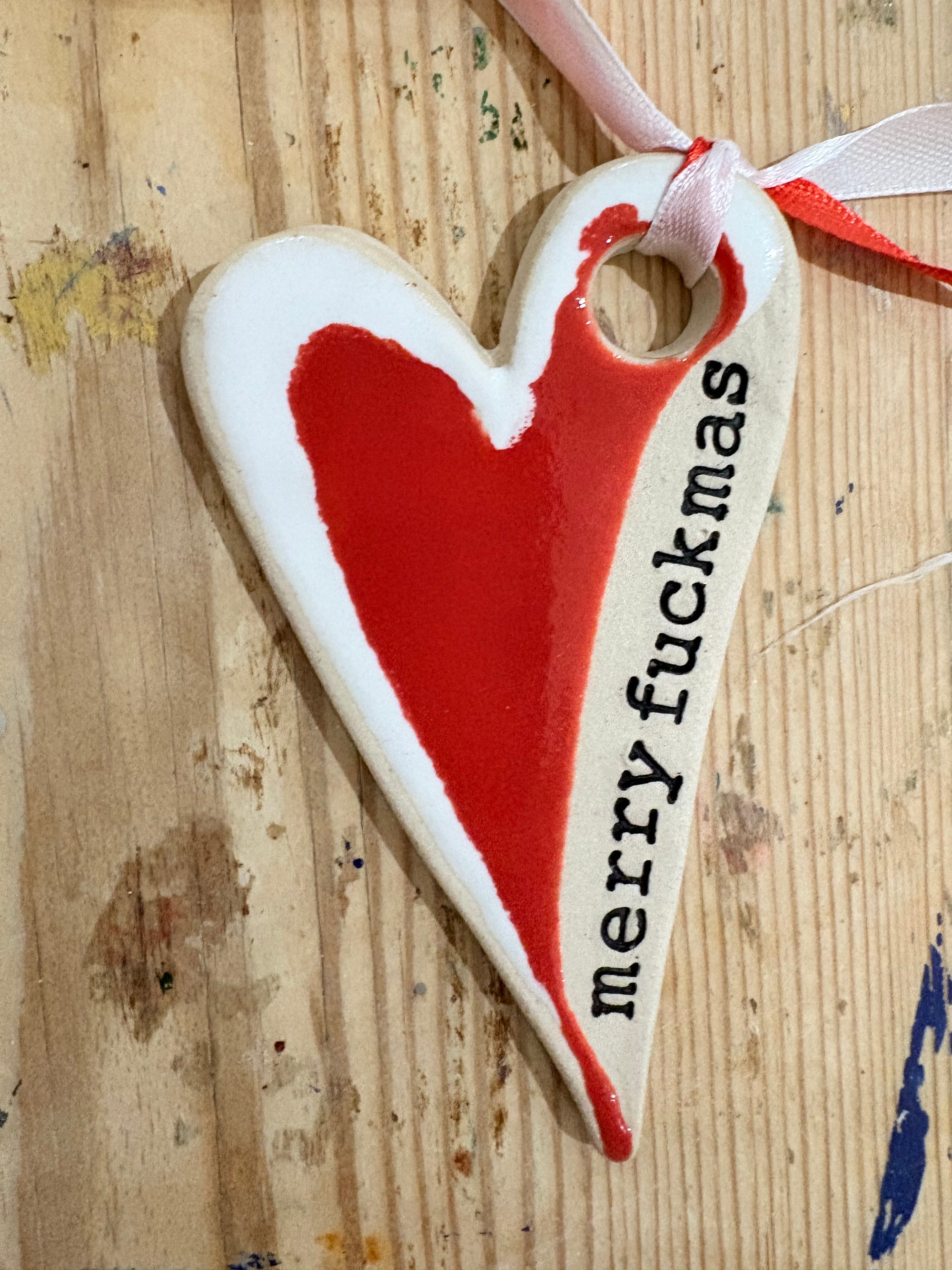 “merry fuckmas” hanging decoration (red and white, larger)