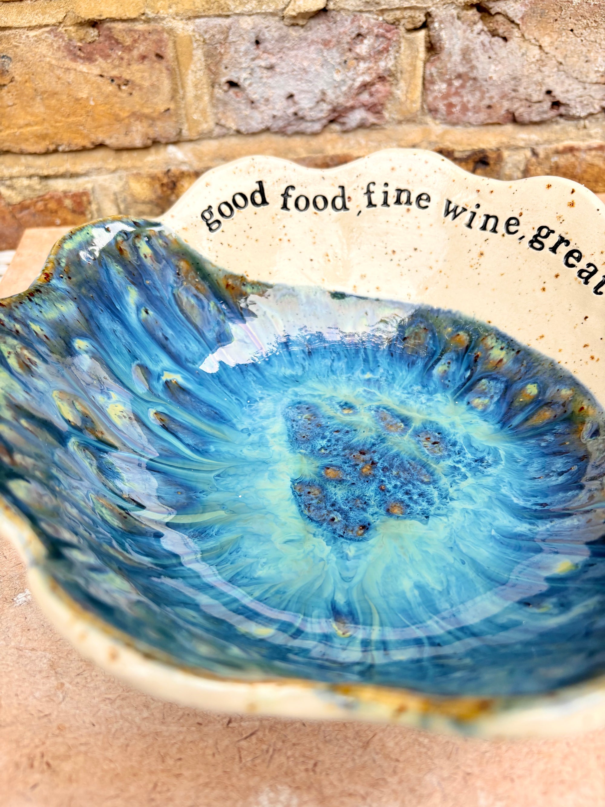 "good food, fine wine, great company..." deep salad/serving dish