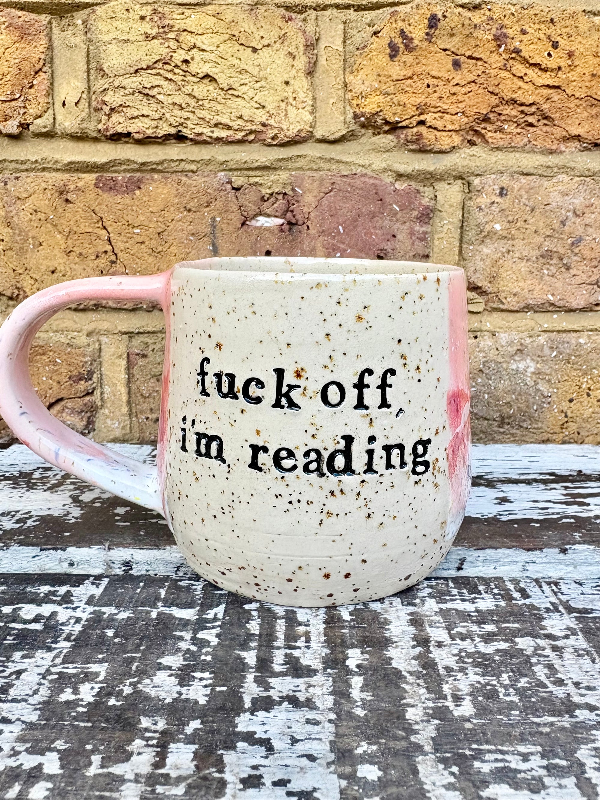 “Fuck off i'm reading" mug (Pink Raspberry Ripple)