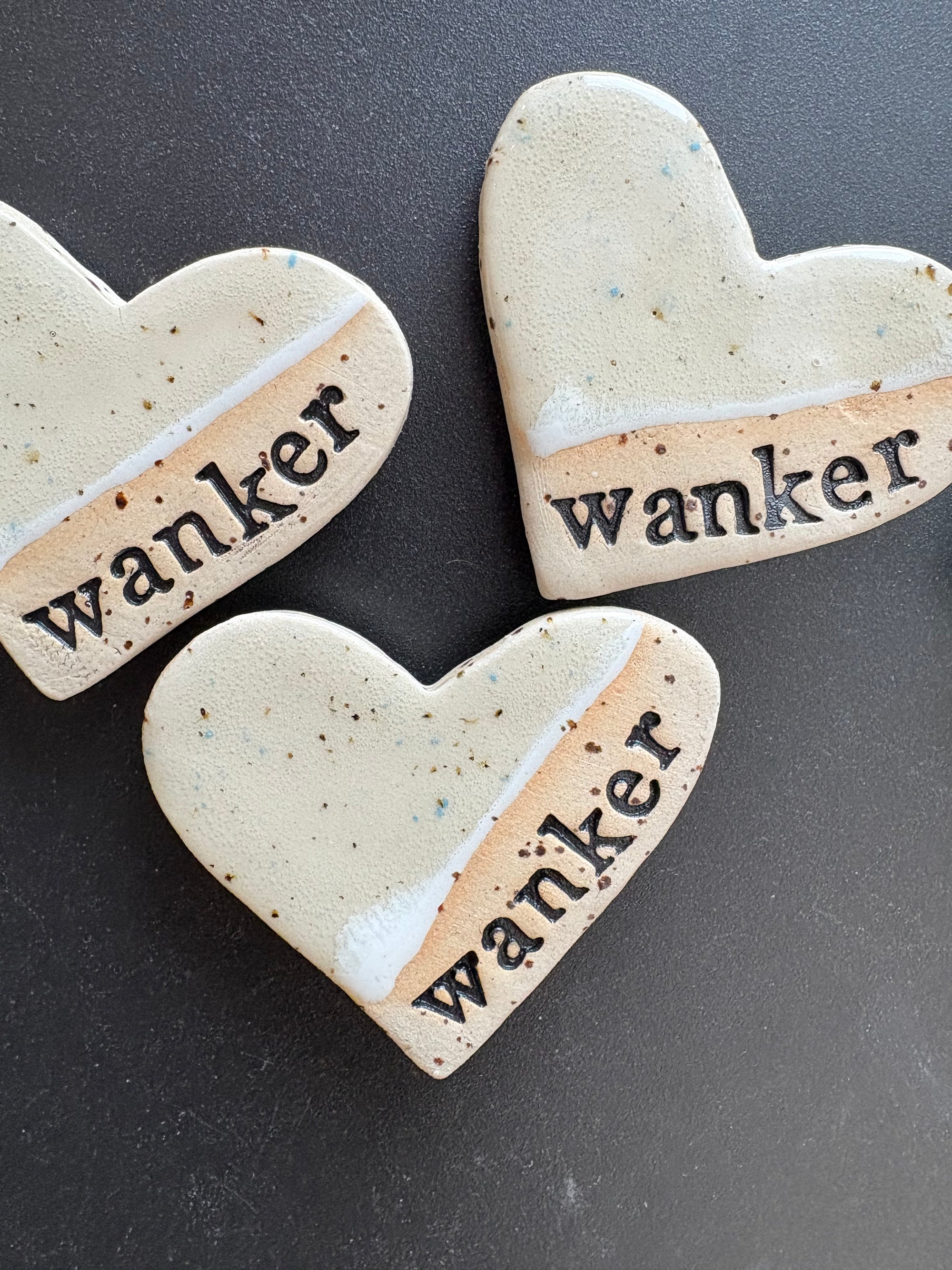“wanker” Magnet (beige, medium)