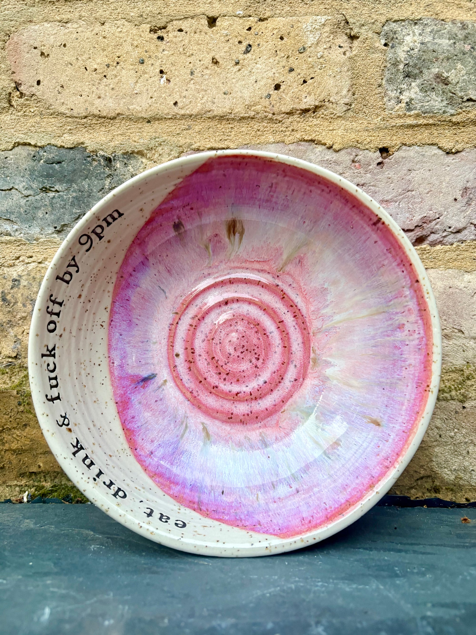 “eat, drink and fuck off by 9pm" round salad/pasta bowl (pink, flecked clay)