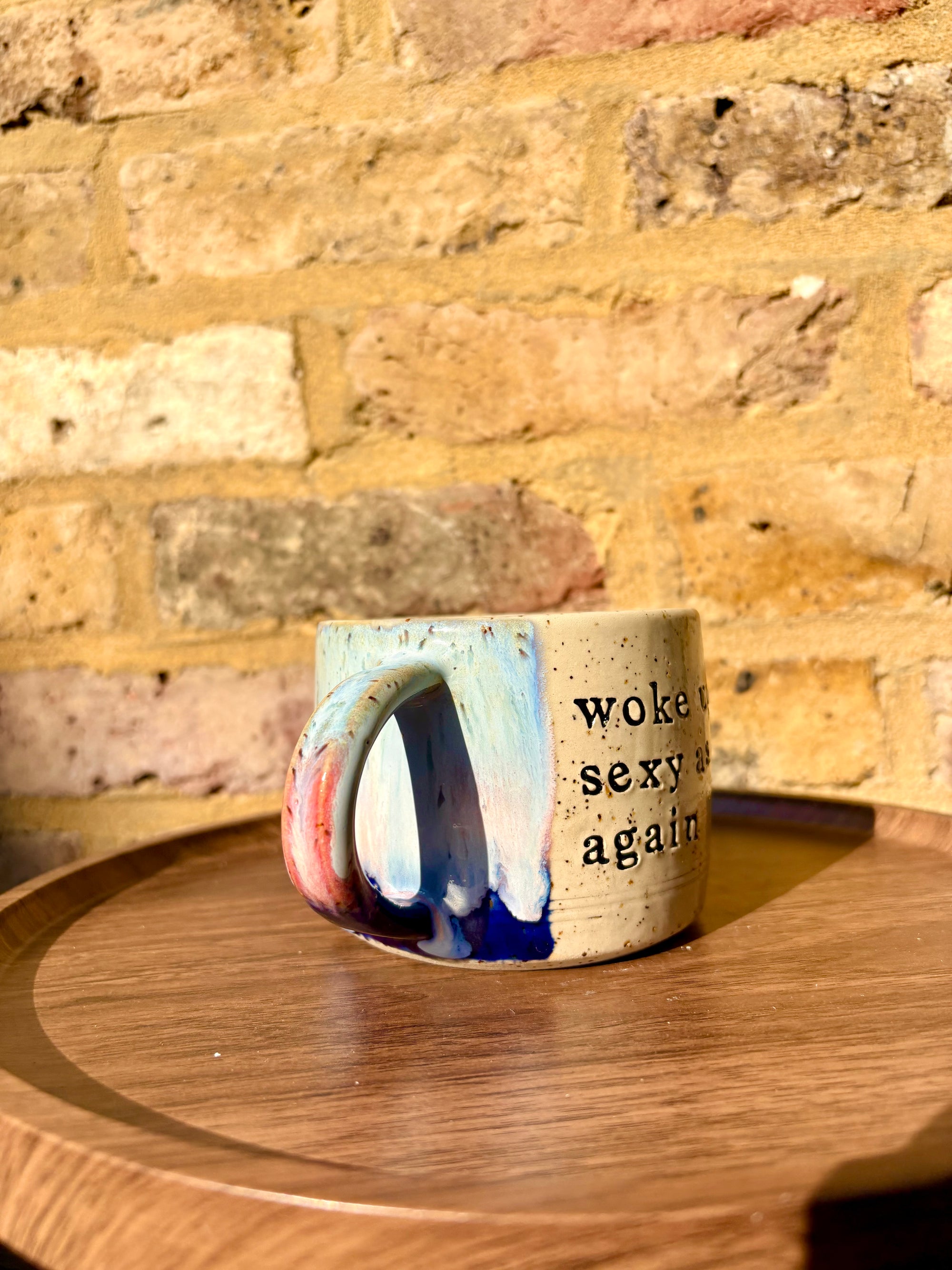 “woke up sexy as hell again” mug