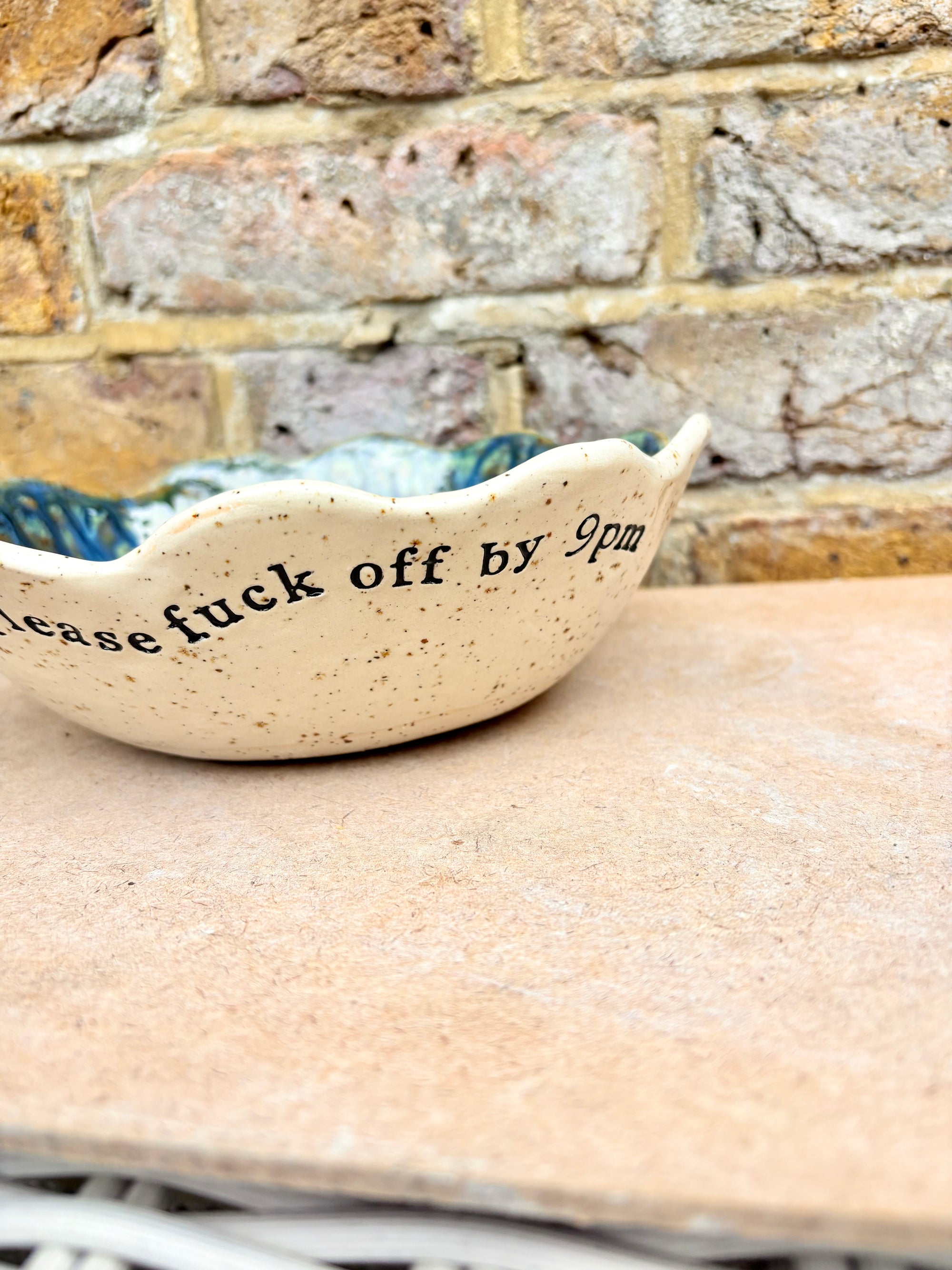 "good food, fine wine, great company..." deep salad/serving dish