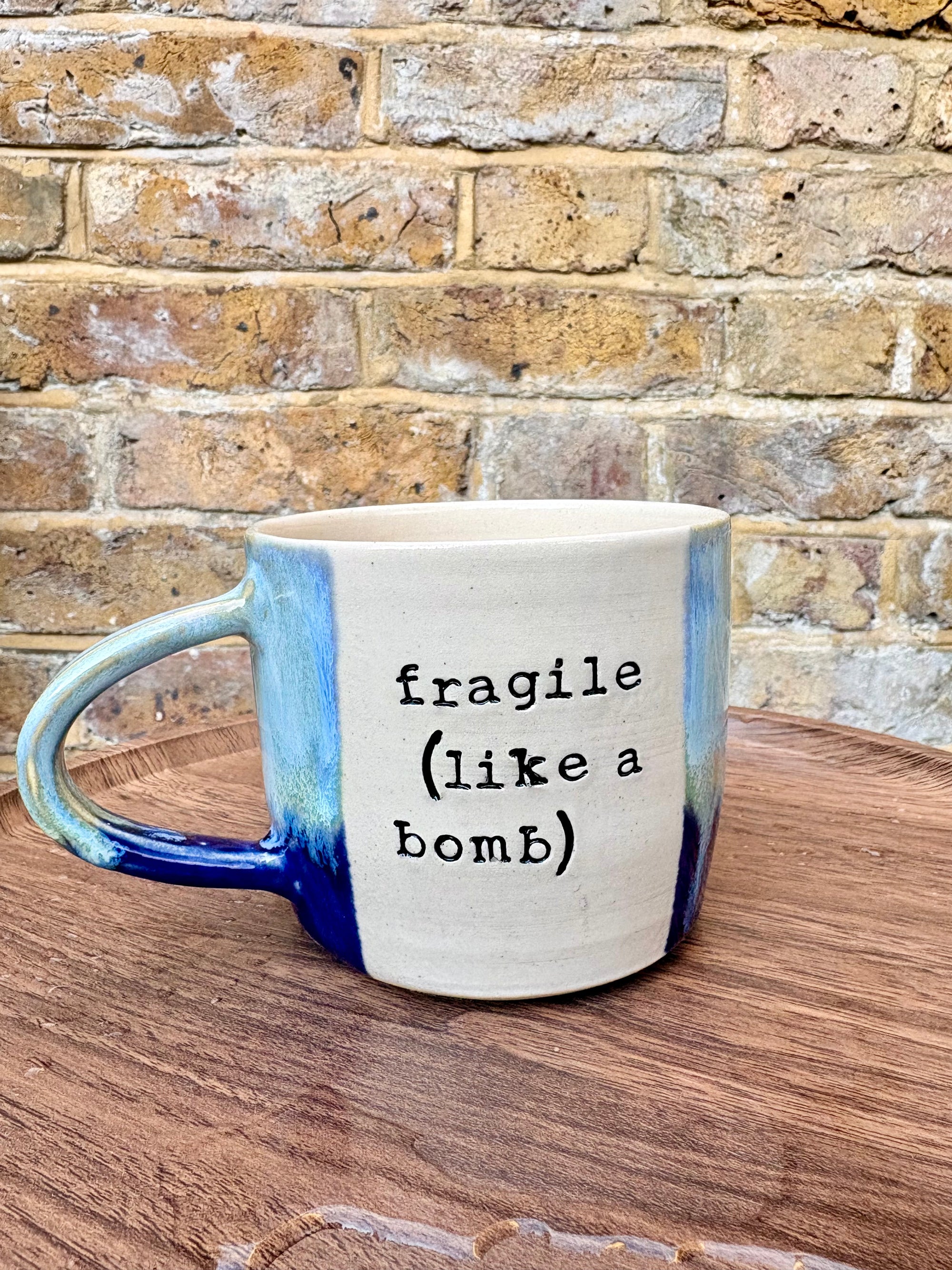 “fragile (like a bomb) mug (blue)