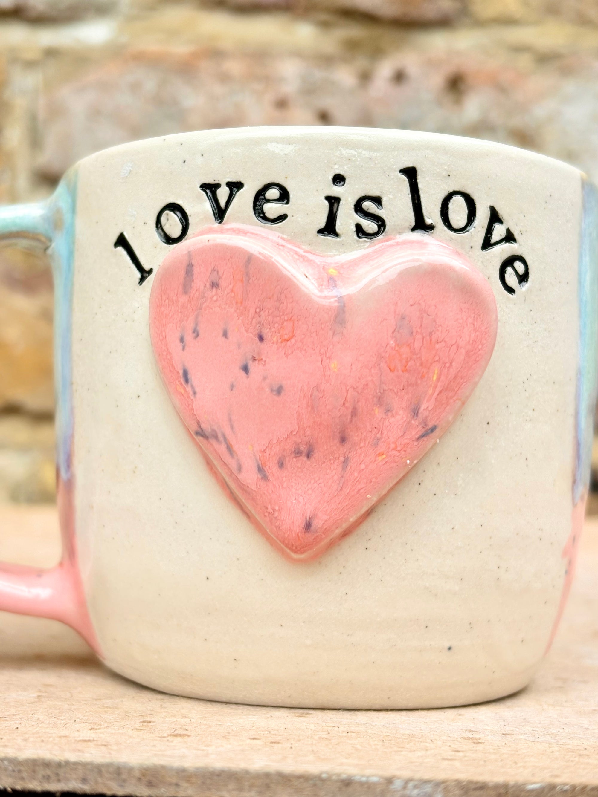 “love is love” mug (pink heart)