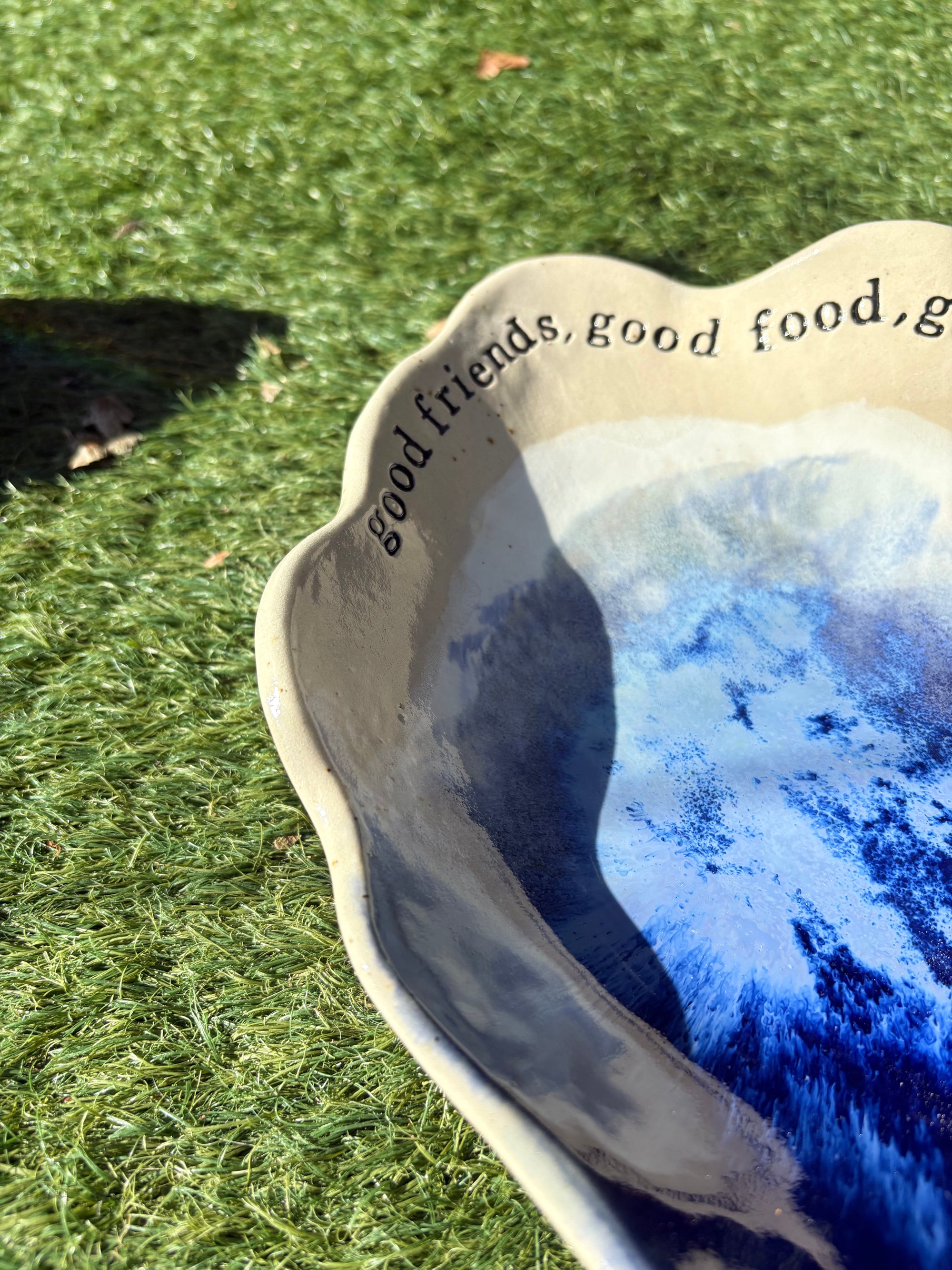 "good food, good wine, good times..." long salad dish
