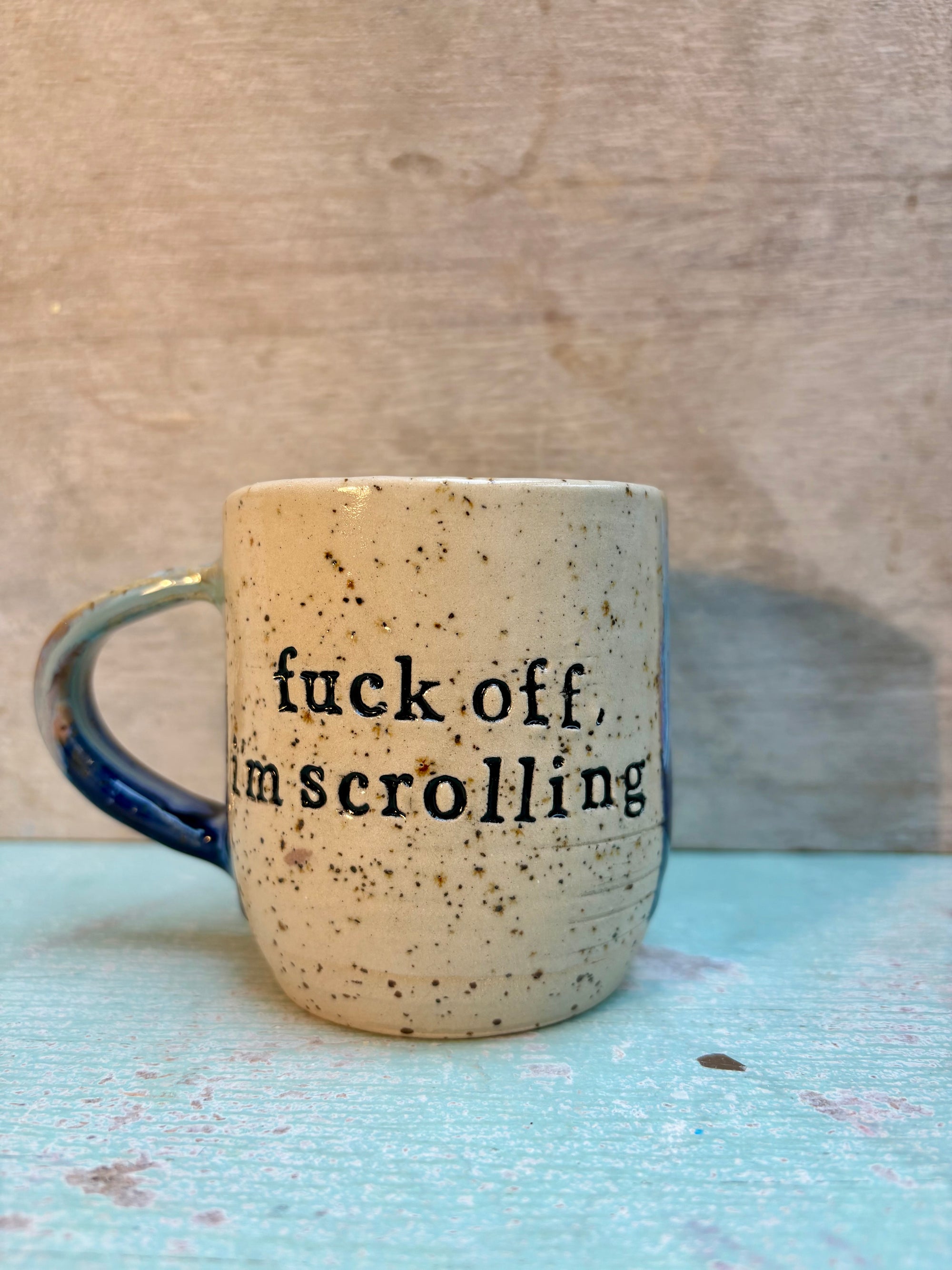 “Fuck off, i'm scrolling" mug