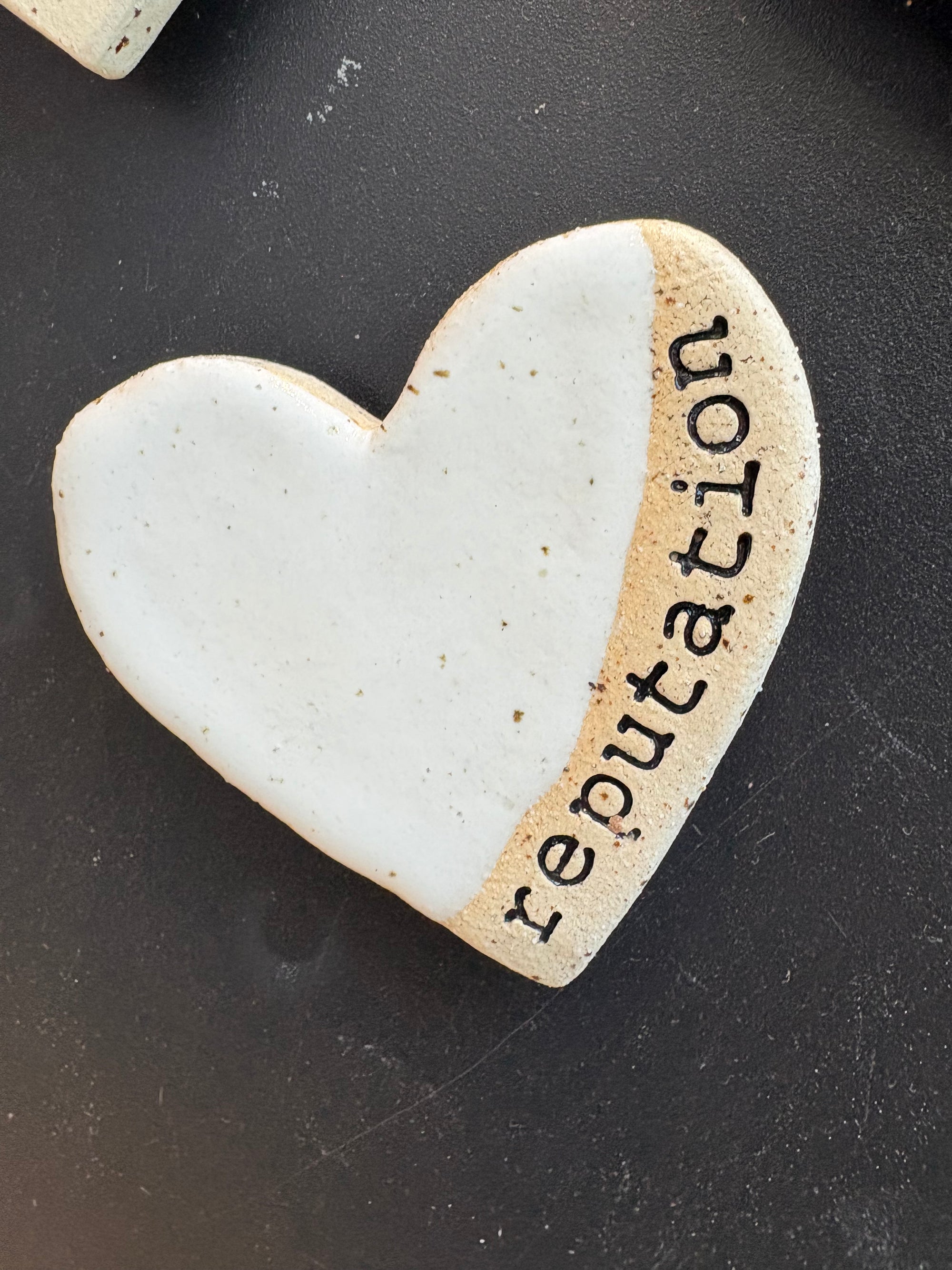Twelve heart shaped Taylor Swift album magnets