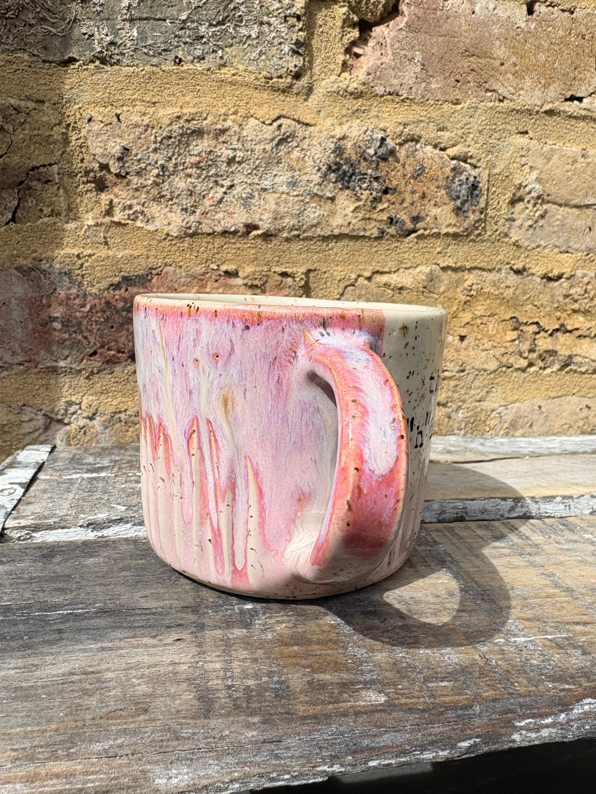 ""there's no "h" in "aitch" except that one" mug (pink)