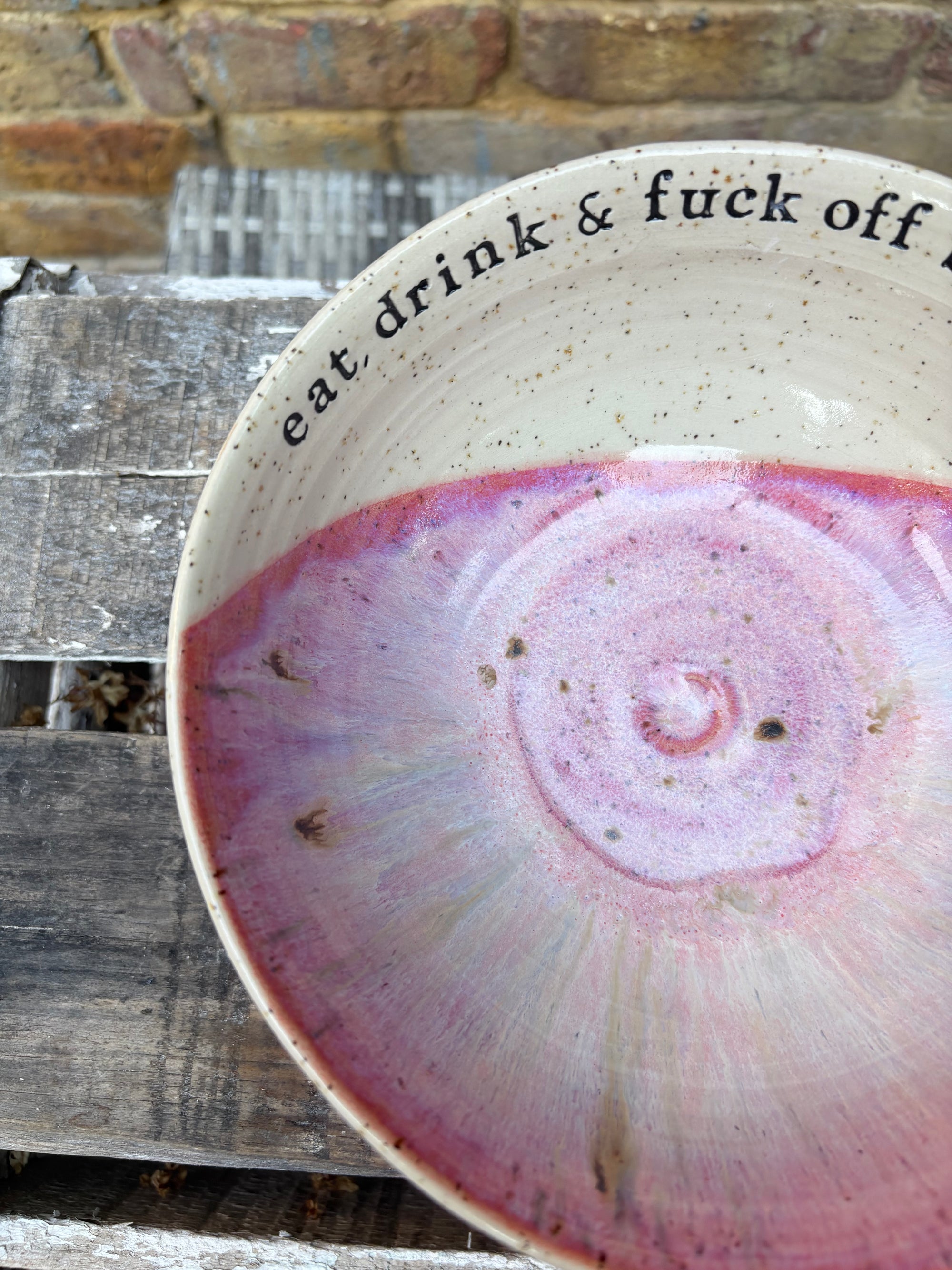 “eat, drink and fuck off by 9pm"  deep round salad/pasta bowl (pink, flecked clay)