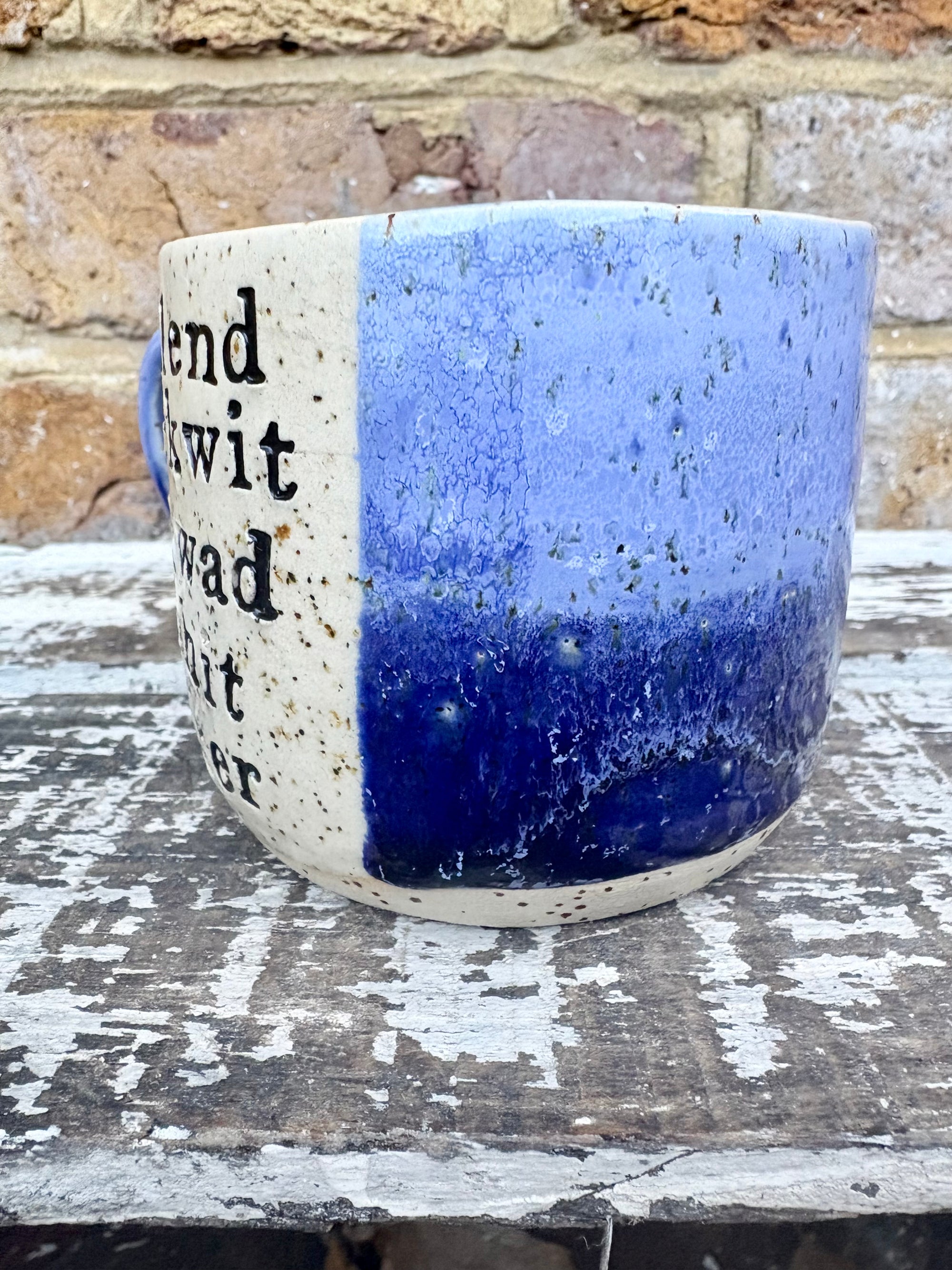 "bellend fuckwit dickwad dipshit wanker" mug (Blues)