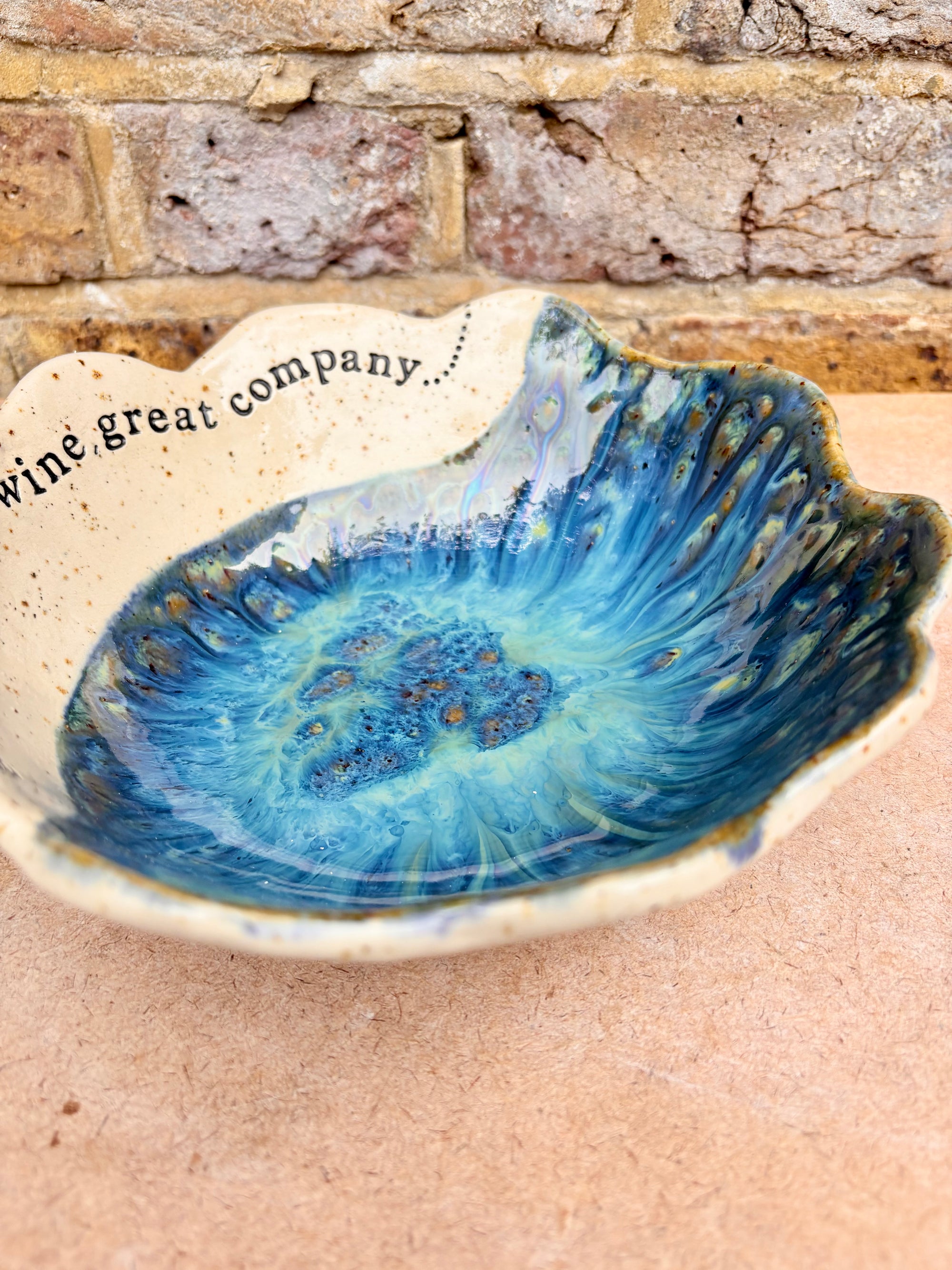 "good food, fine wine, great company..." deep salad/serving dish