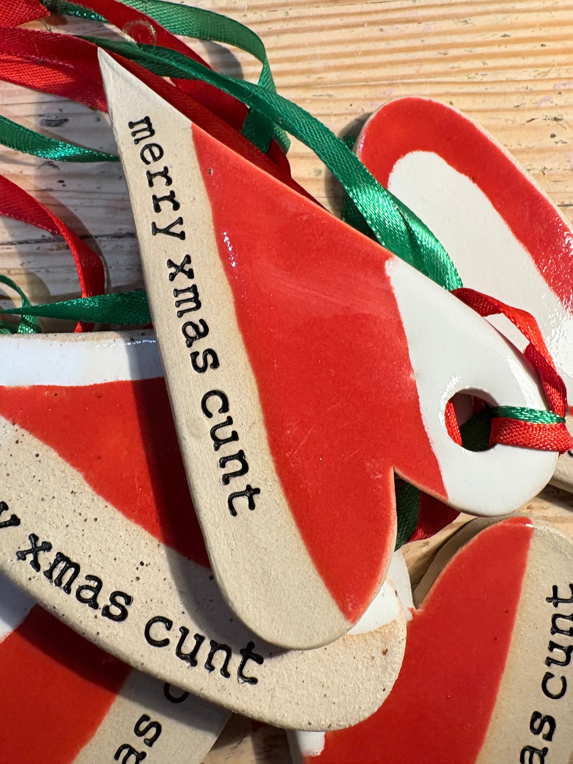“merry xmas cunt” hanging decoration (red and white, large)
