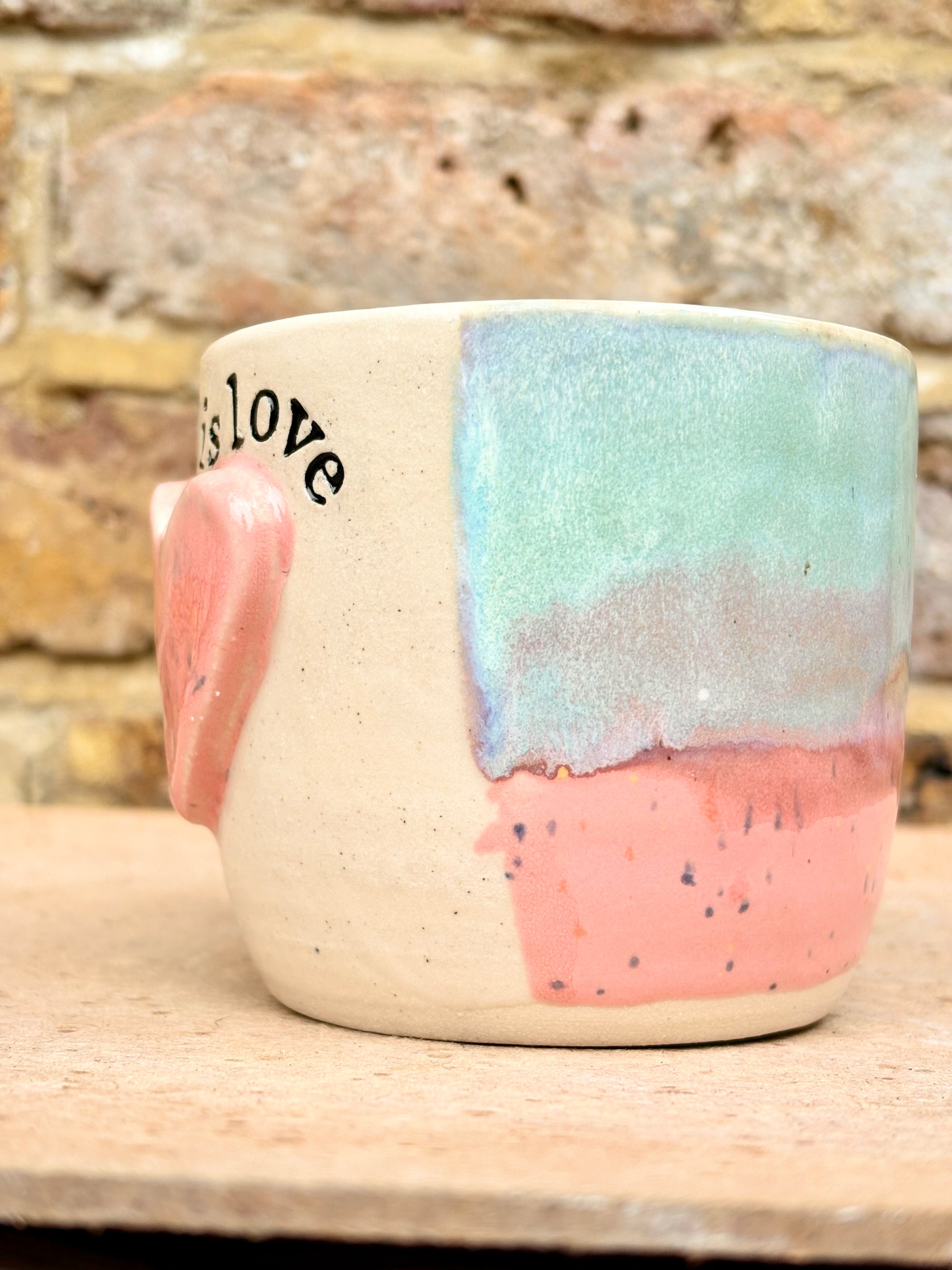 “love is love” mug (pink heart)