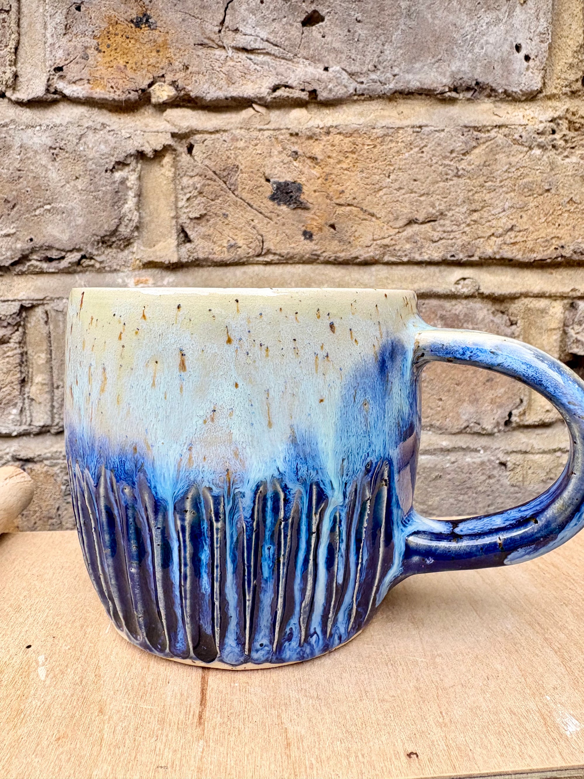 “A book a day keeps reality away" mug (blue night sky)
