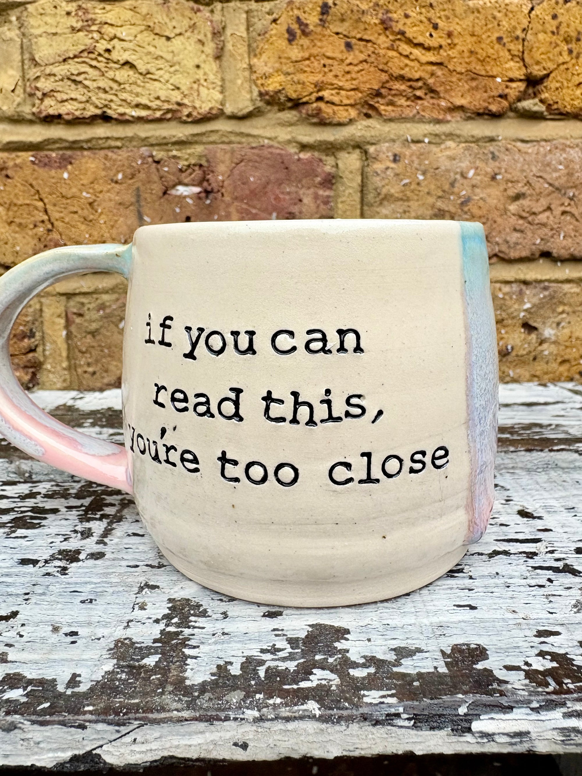 "if you can read this, you're too close" mug (Pink Skies)