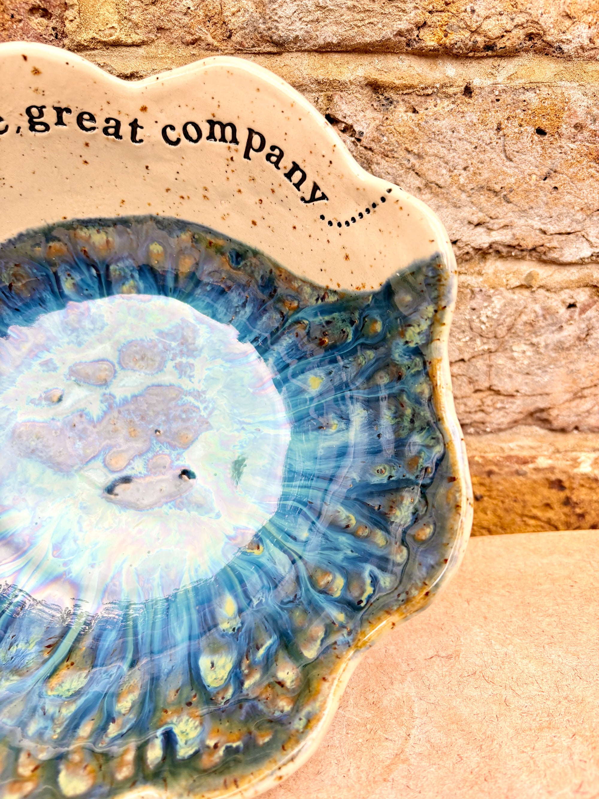 "good food, fine wine, great company..." deep salad/serving dish