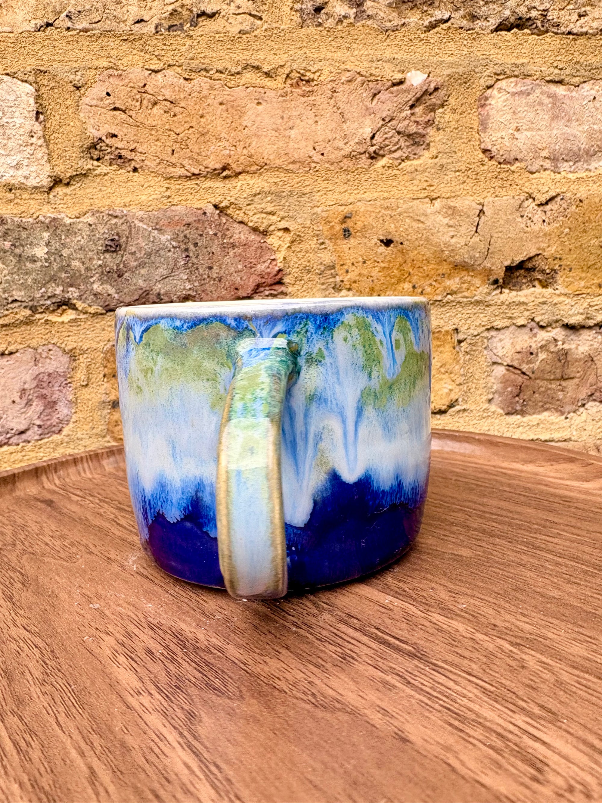 “What” “the fuck” mug (cream, blue/green)