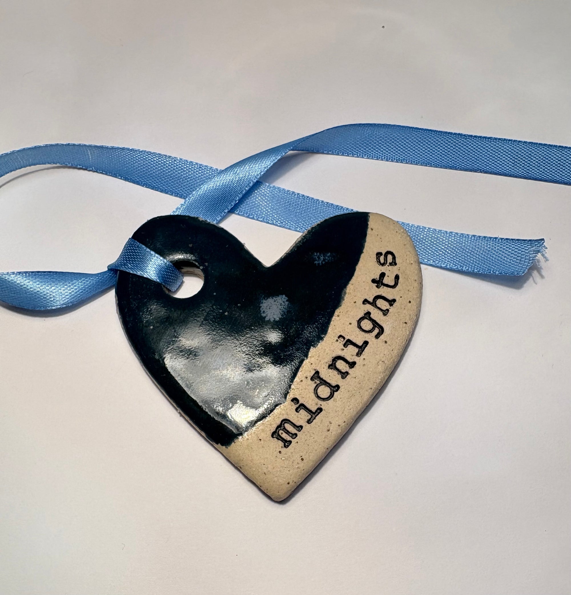“Midnights" hanging decoration
