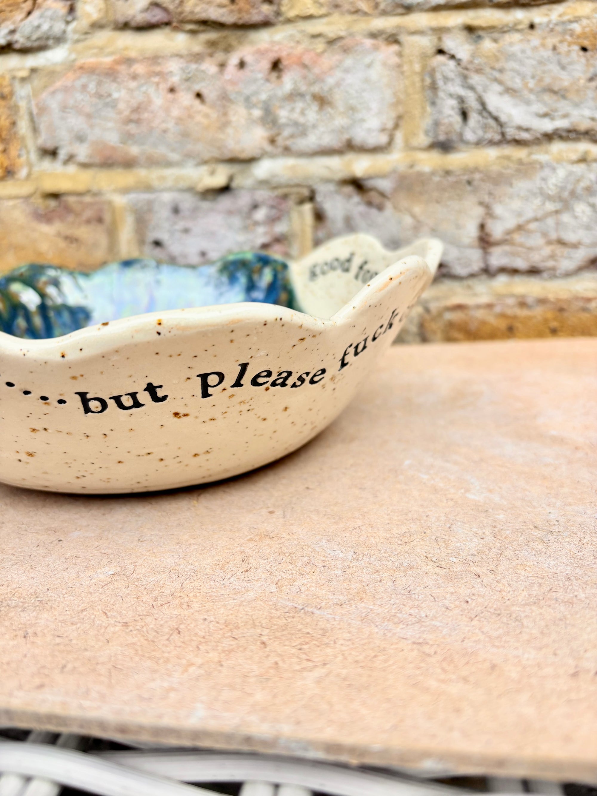 "good food, fine wine, great company..." deep salad/serving dish