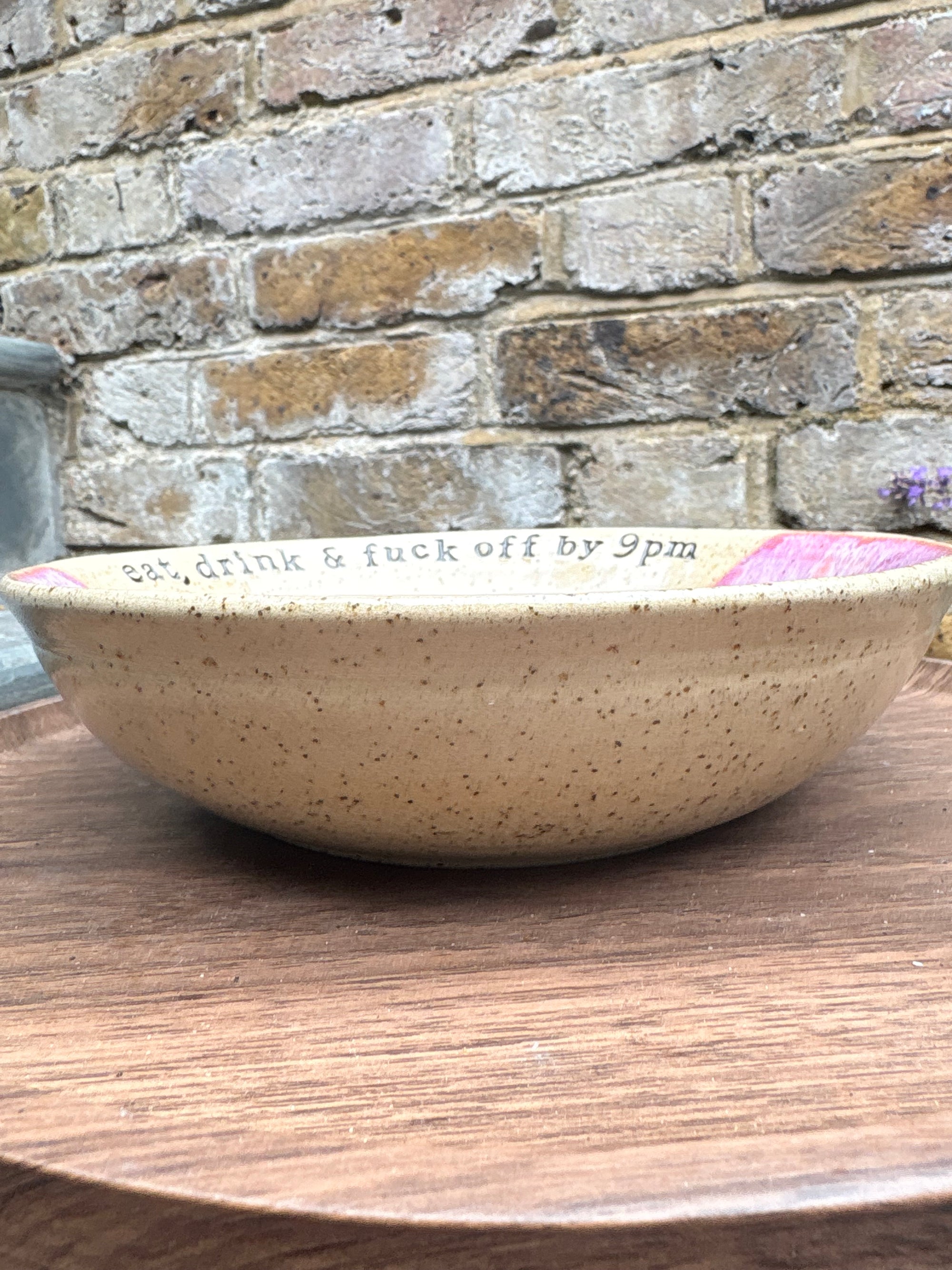 “eat, drink and fuck off by 9pm"  deep round salad/pasta bowl (pink, dark flecked clay)