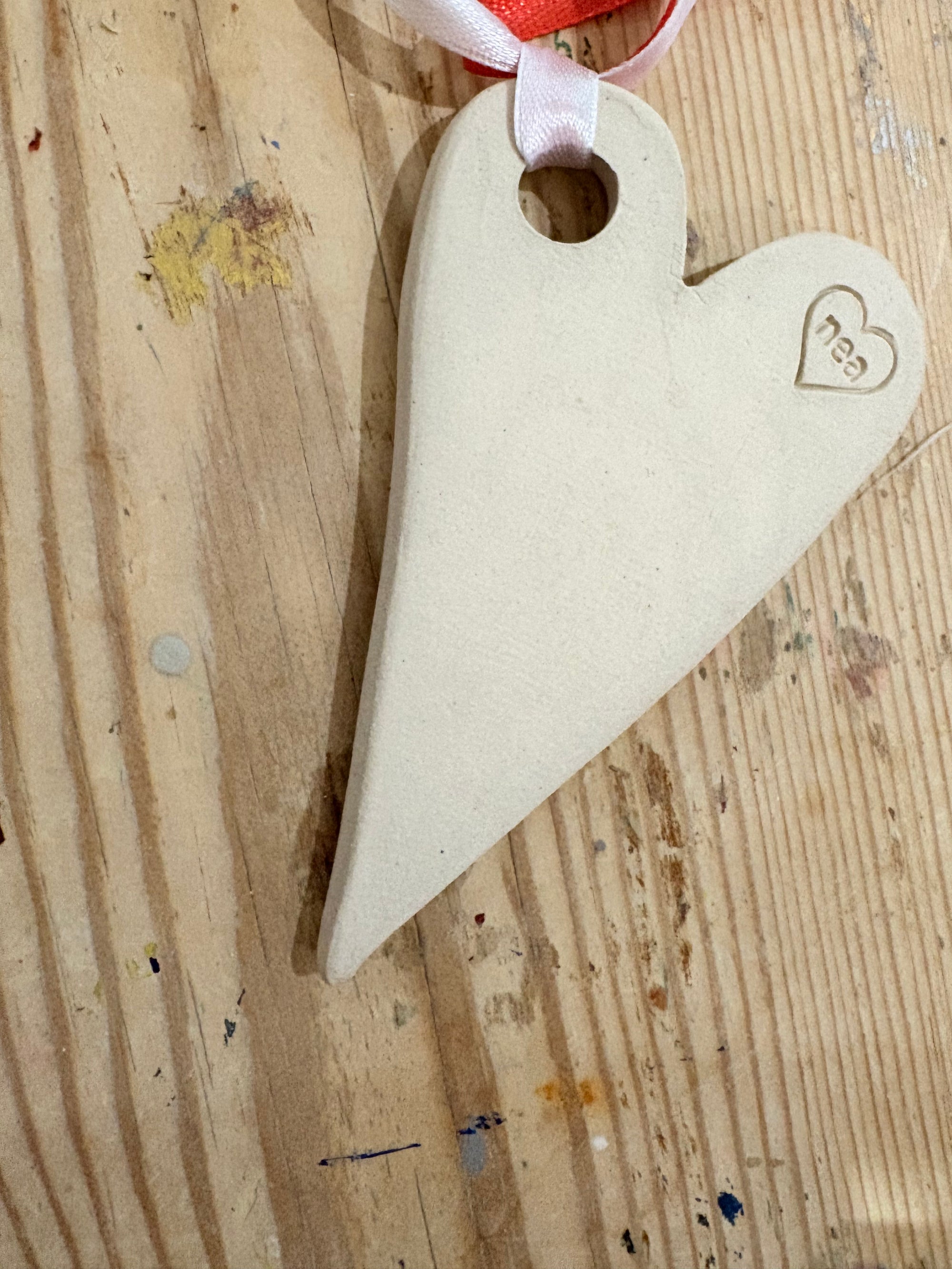 “merry fuckmas” hanging decoration (red and white, larger)