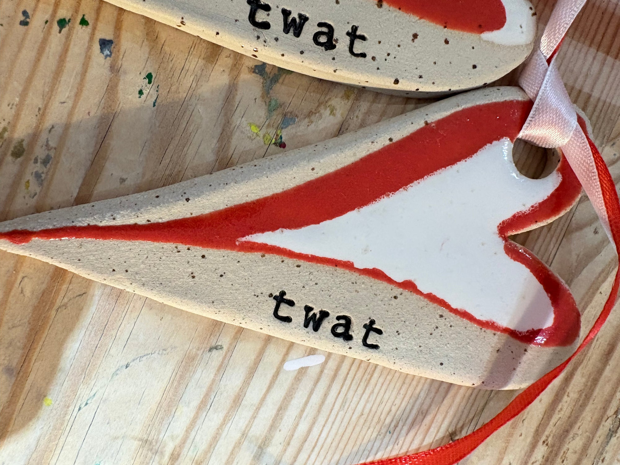 “twat” hanging decoration (red and white, large)