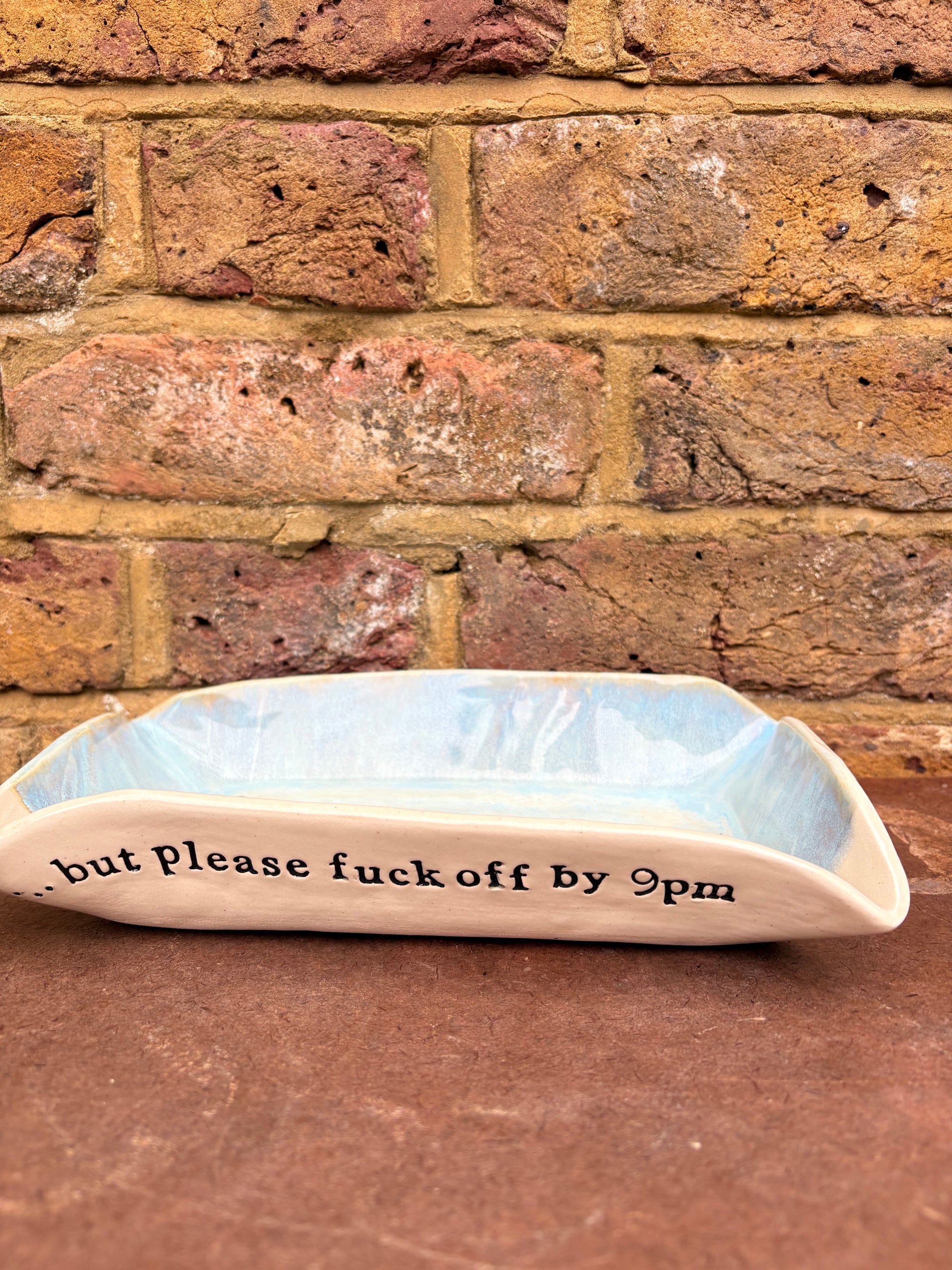 “good food, fine wine, great company..." rectangular salad/serving dish