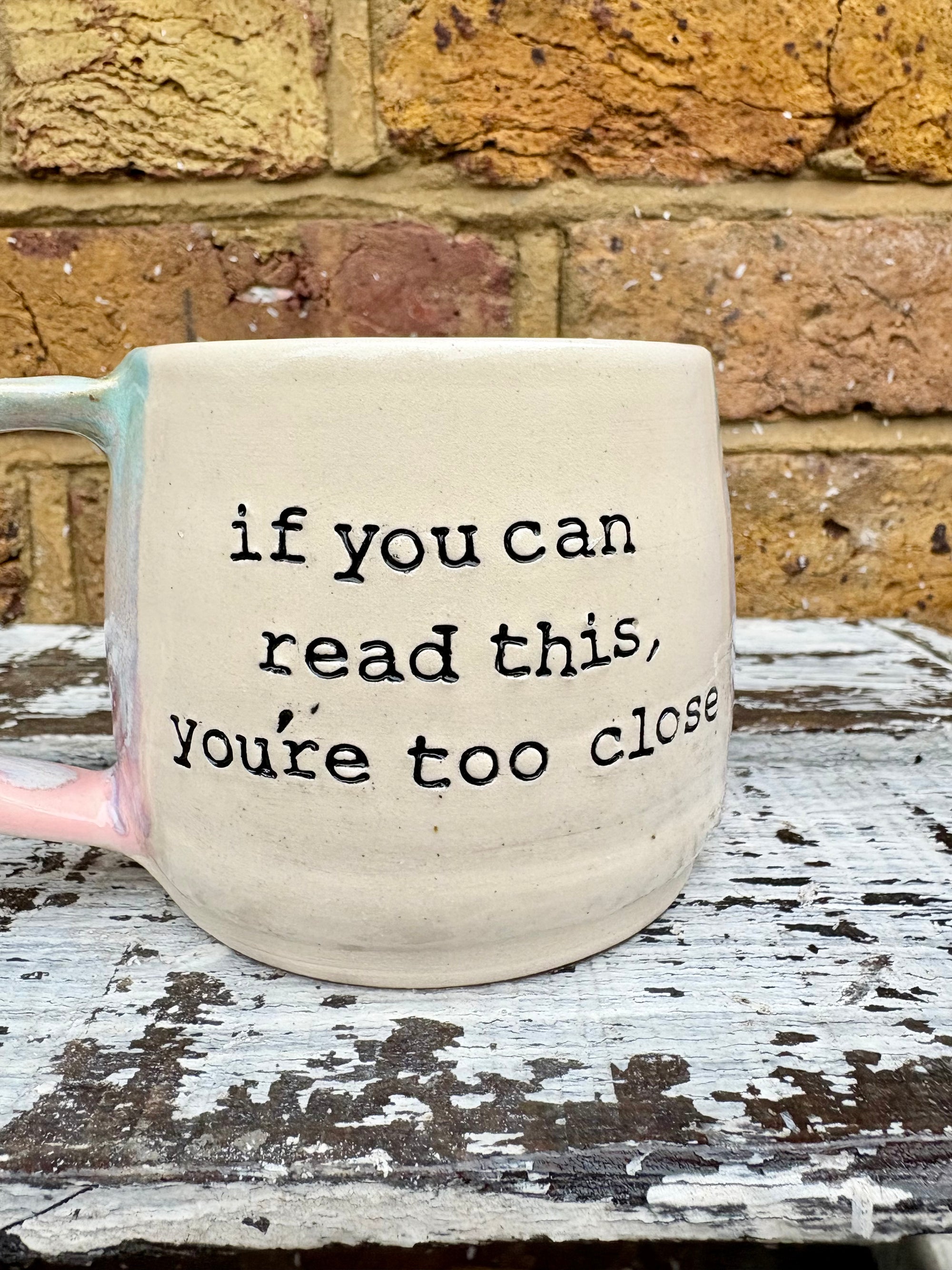 "if you can read this, you're too close" mug (Pink Skies)