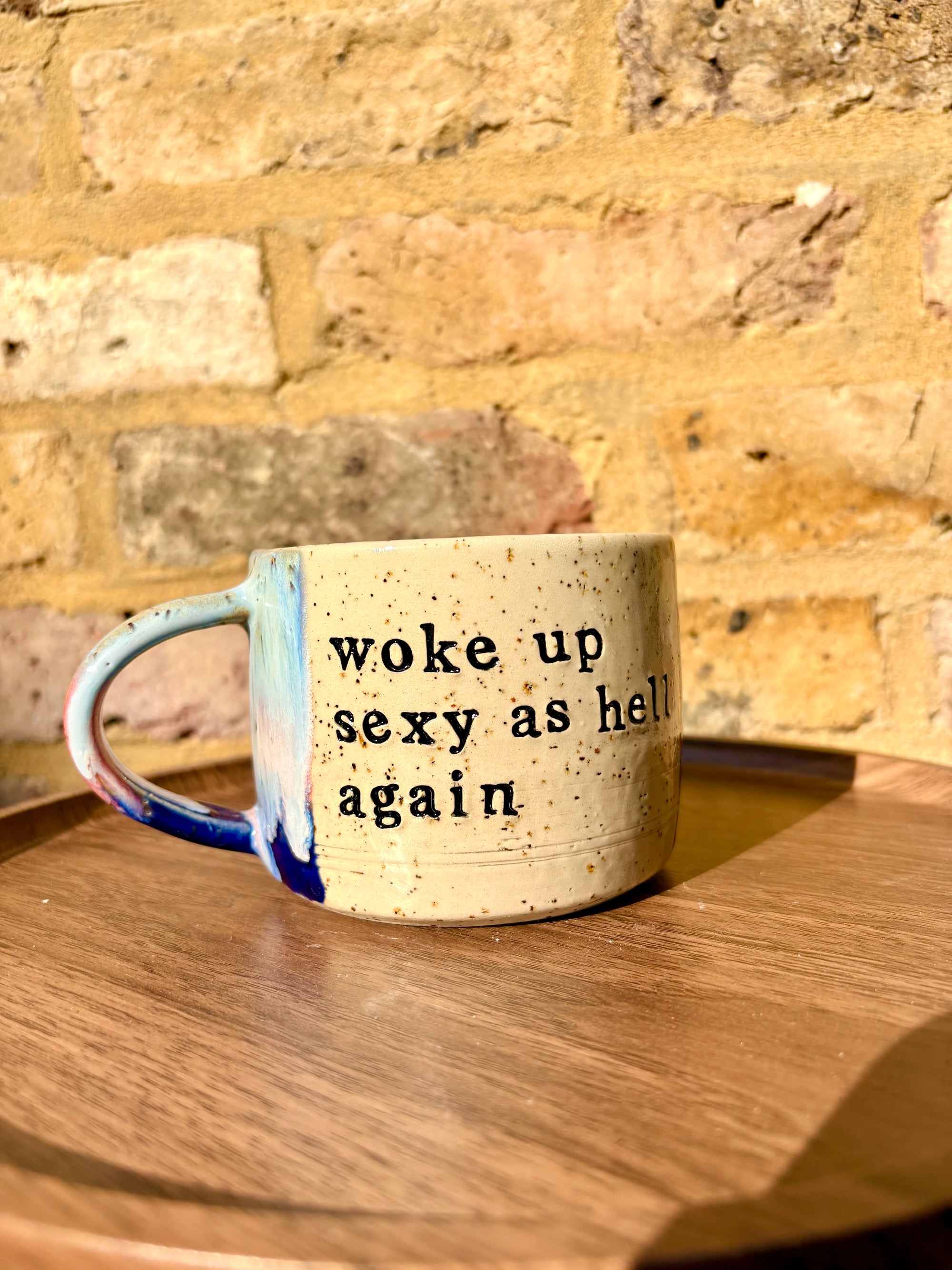 “woke up sexy as hell again” mug