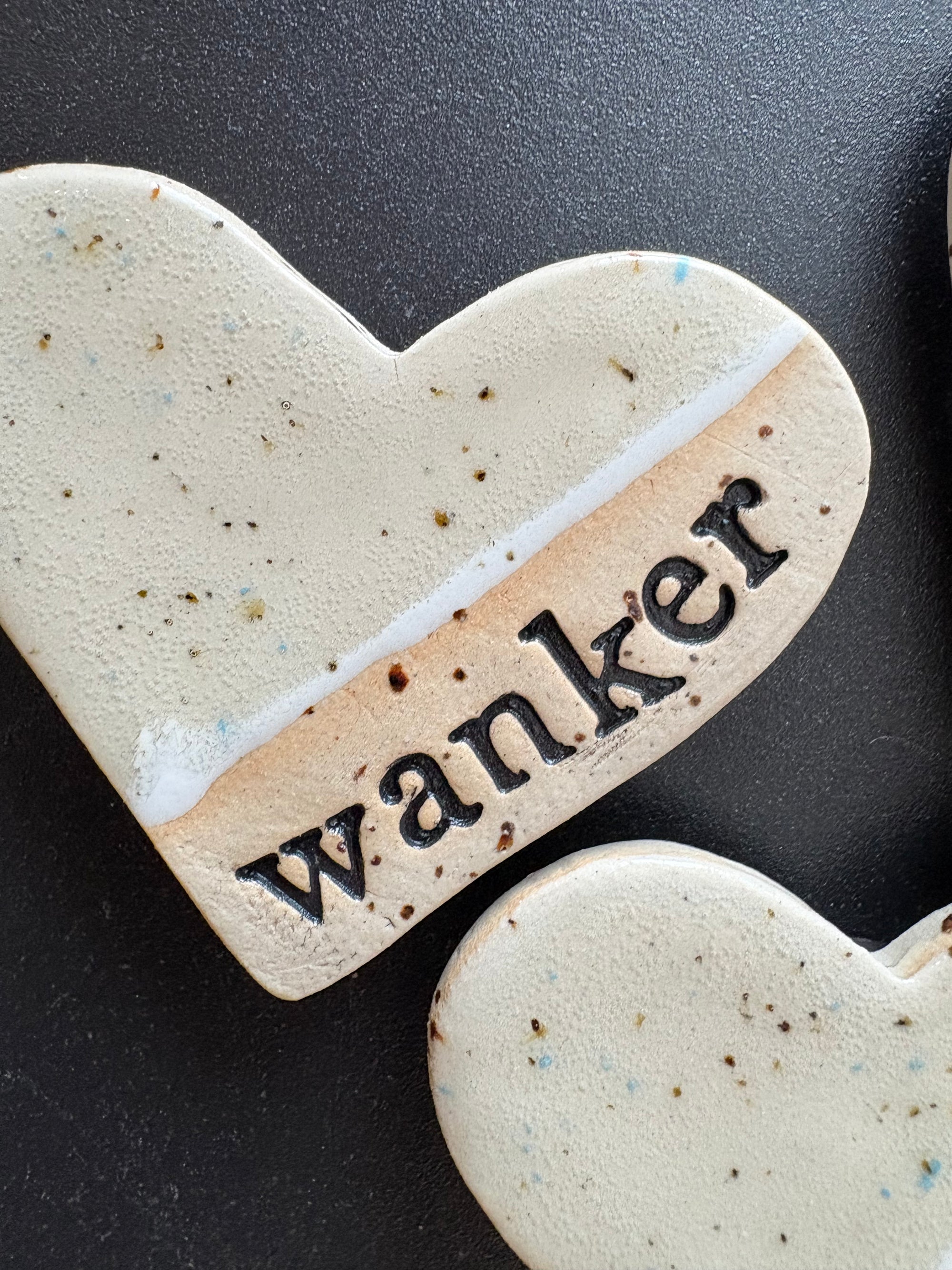 “wanker” Magnet (beige, medium)