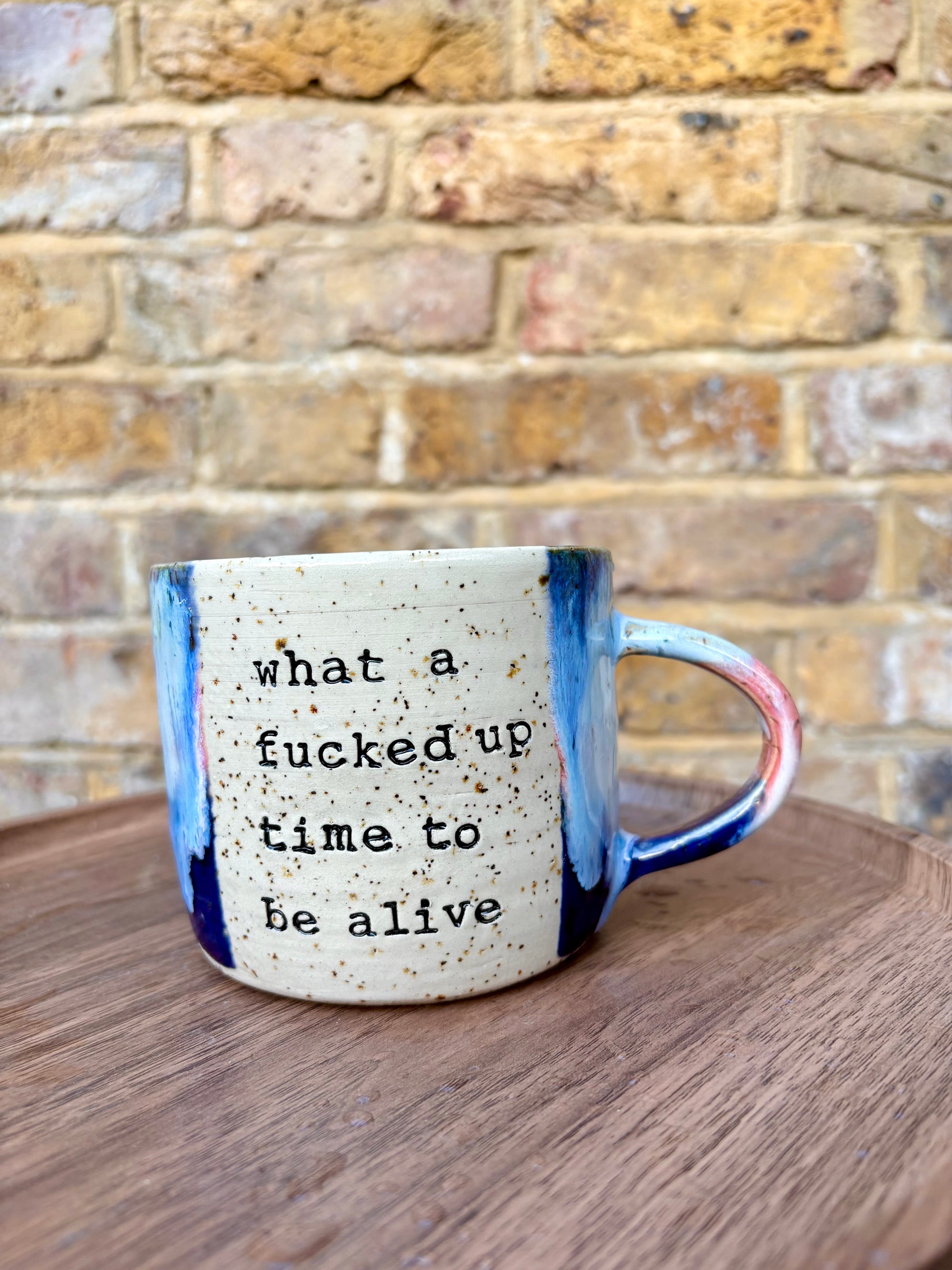 "what a fucked up time to be alive" mug (Pink Night Sky)