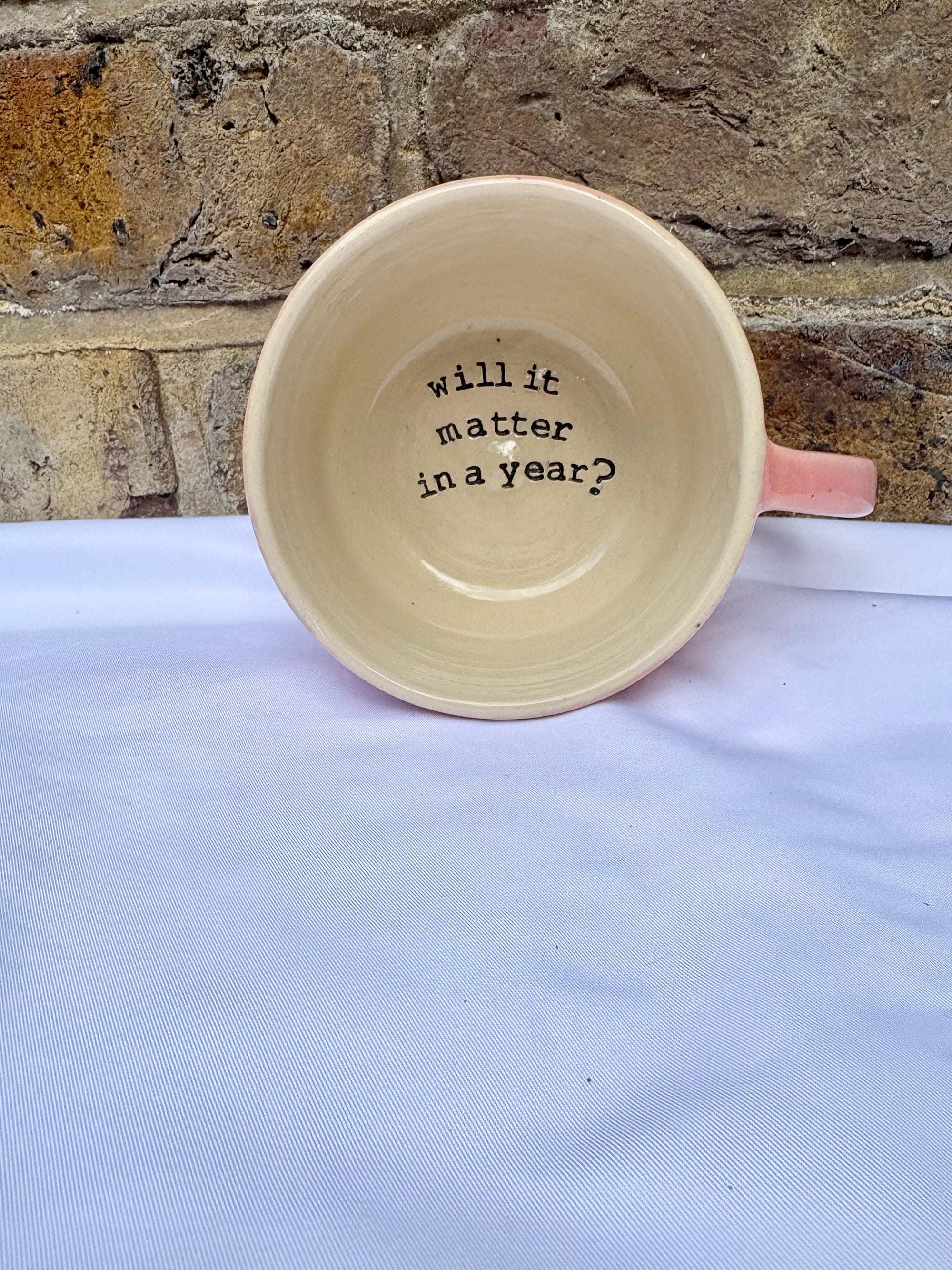 "will it matter in a year" mug