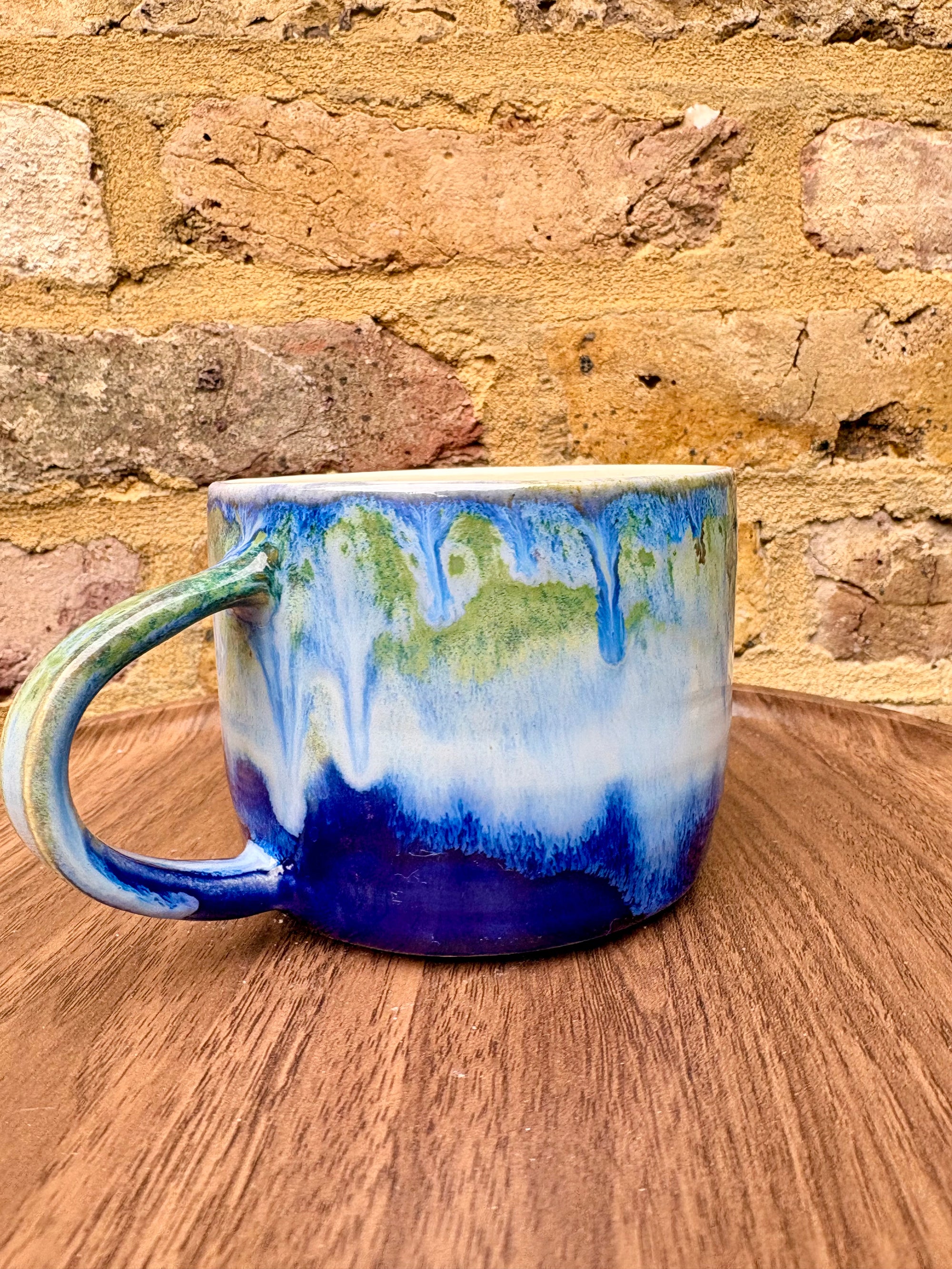 “What” “the fuck” mug (cream, blue/green)