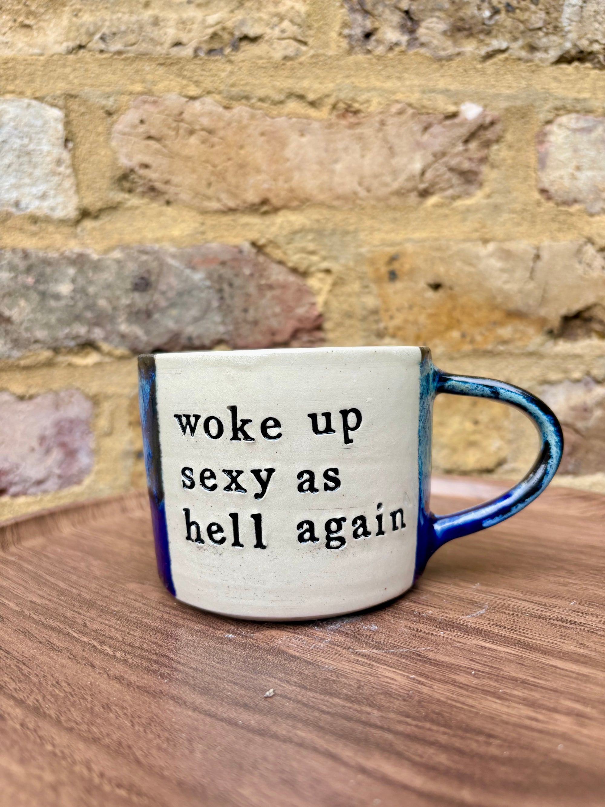 “woke up sexy as hell again” mug (blue shore)