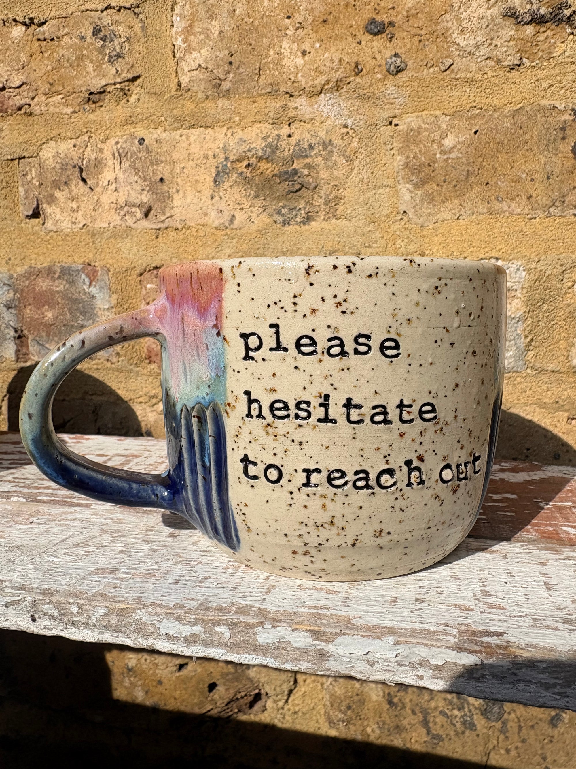 "please hesitate to reach out" mug (pink night sky)