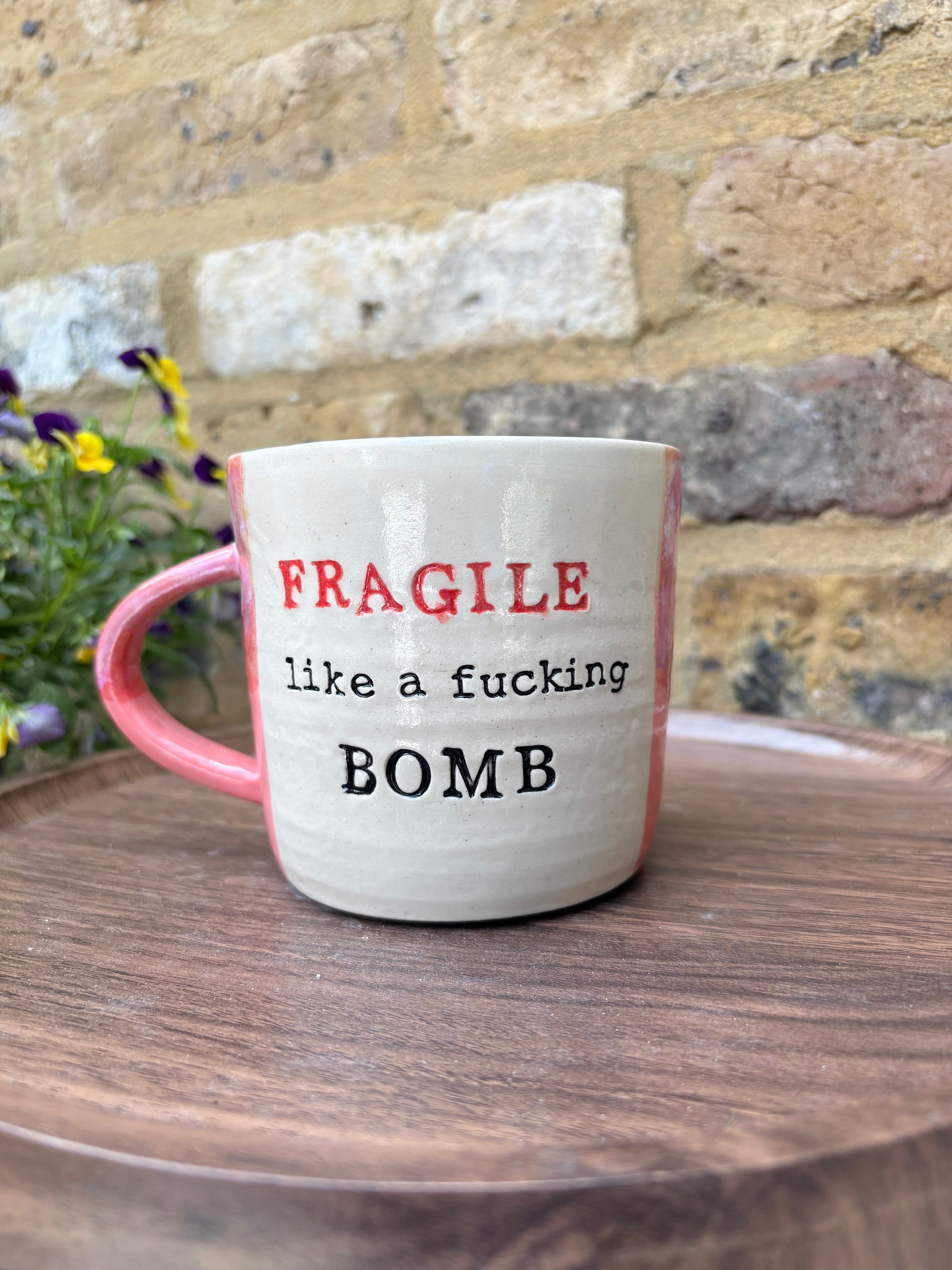 "FRAGILE like a fucking bomb" mug (pink wood, cream clay)